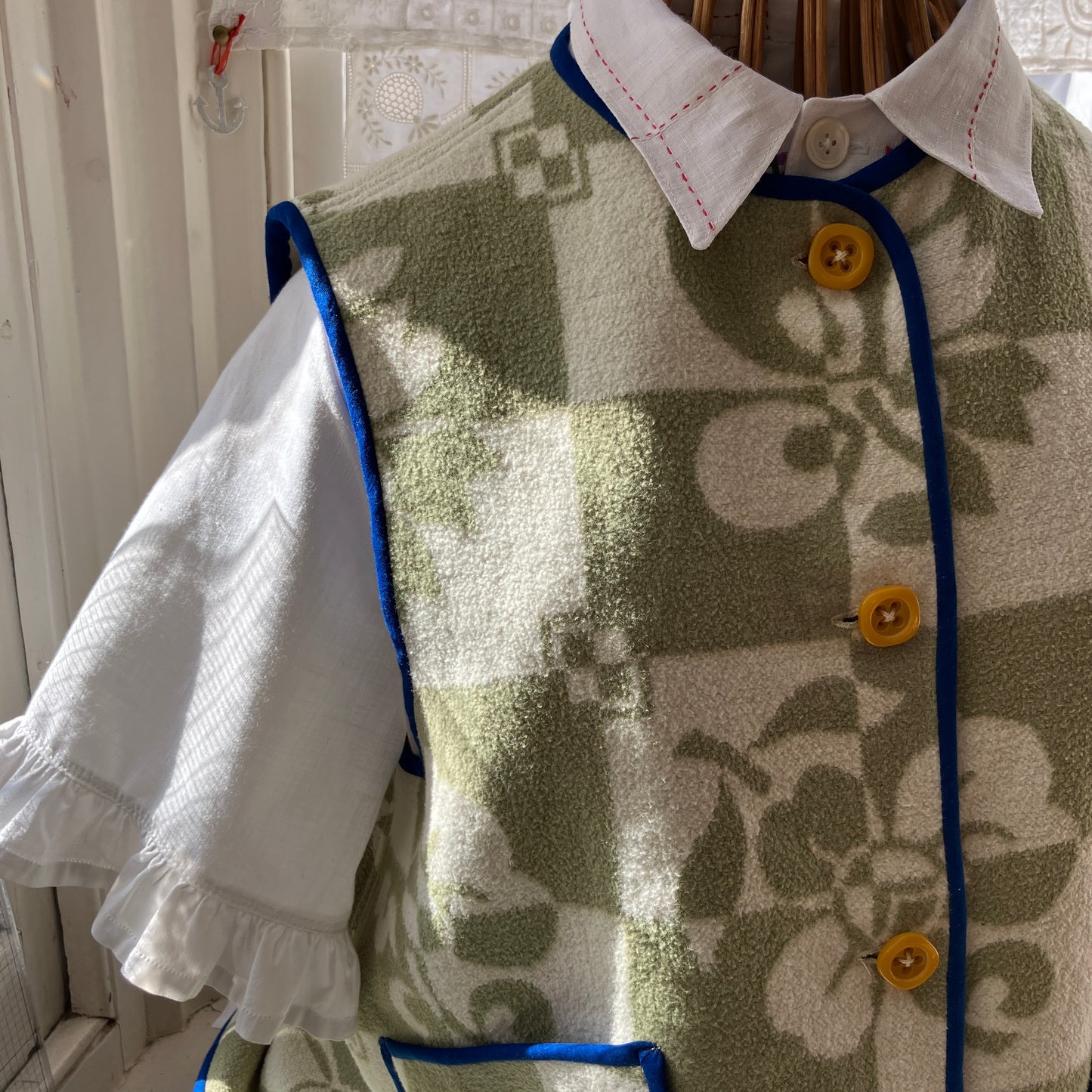 Reclaimed blanket vest in green and white checks and leaves pattern