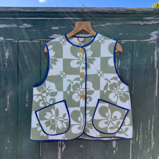 Reclaimed blanket vest in green and white checks and leaves pattern