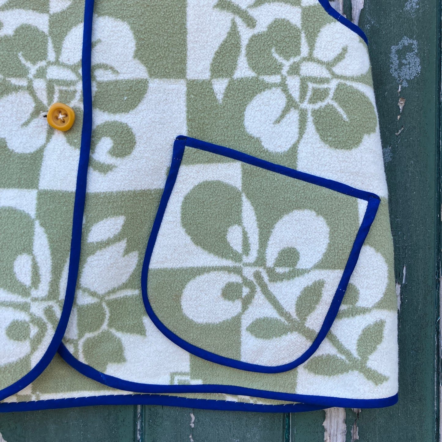 Reclaimed blanket vest in green and white checks and leaves pattern
