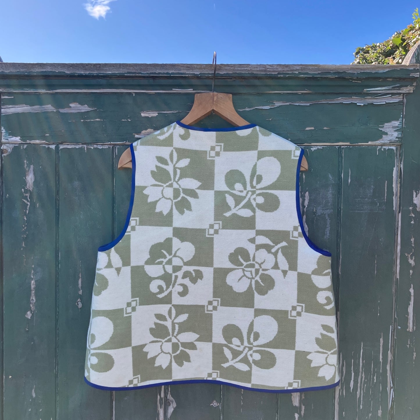 Reclaimed blanket vest in green and white checks and leaves pattern