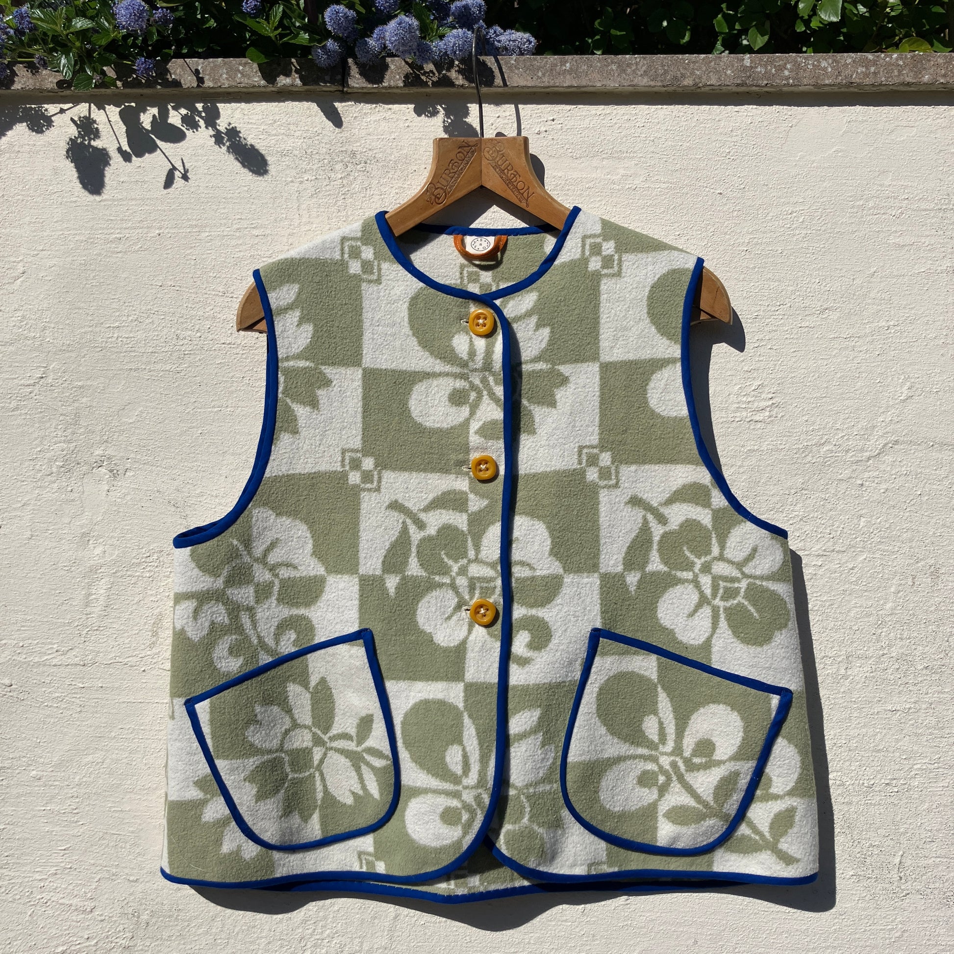 Reclaimed blanket vest in green and white checks and leaves pattern