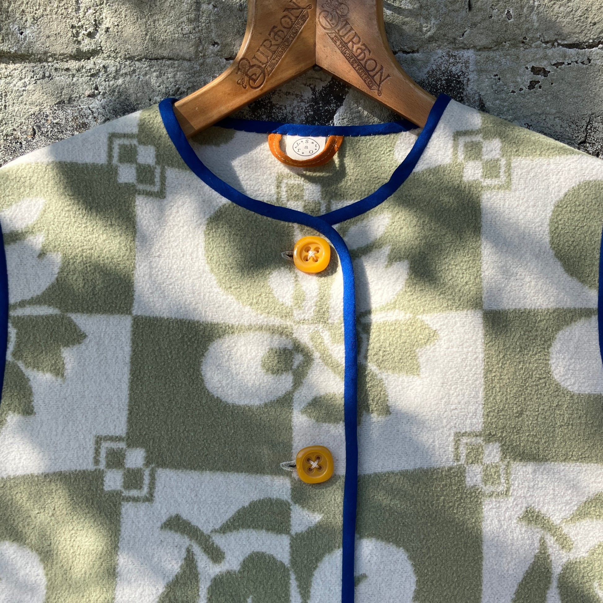 Reclaimed blanket vest in green and white checks and leaves pattern