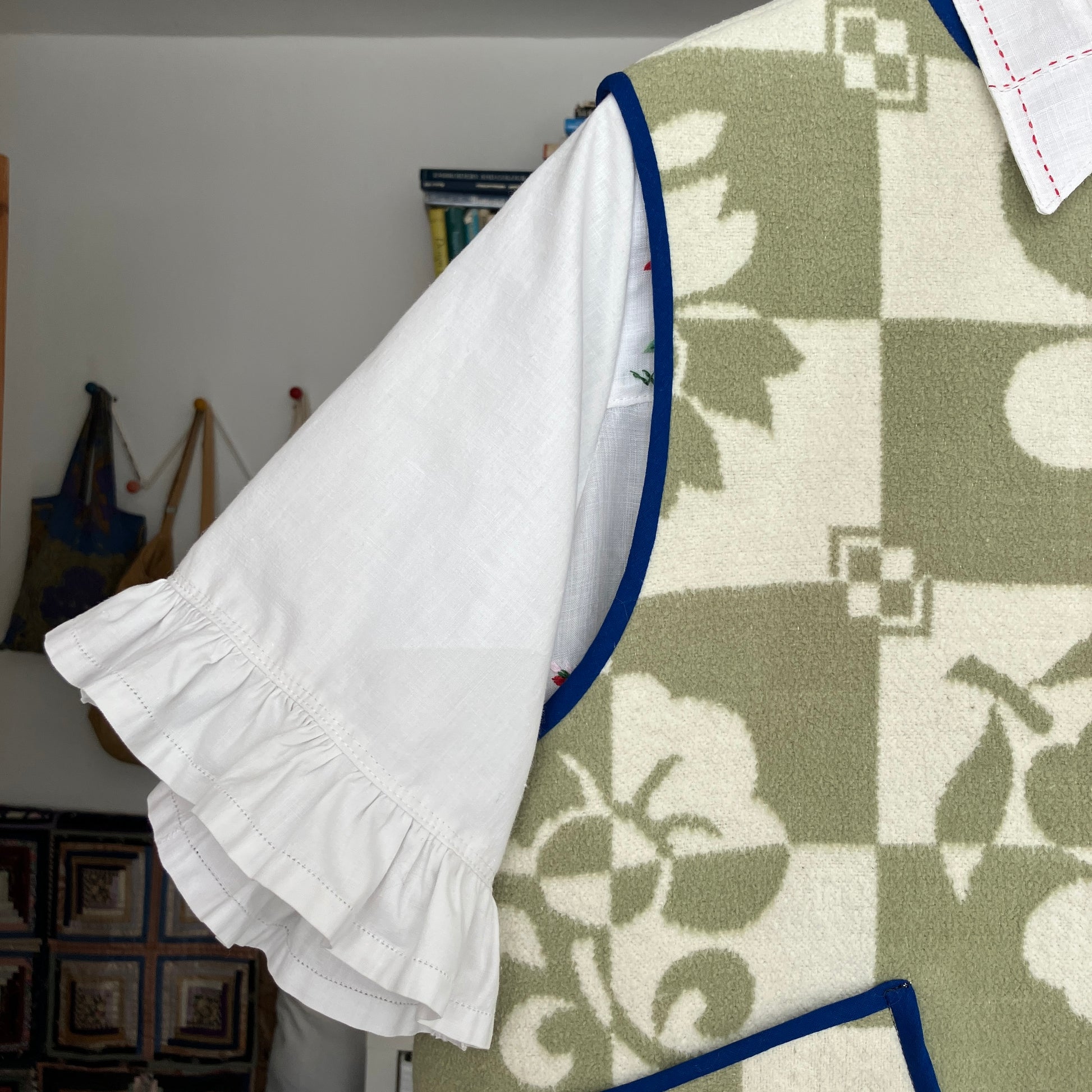 Reclaimed blanket vest in green and white checks and leaves pattern