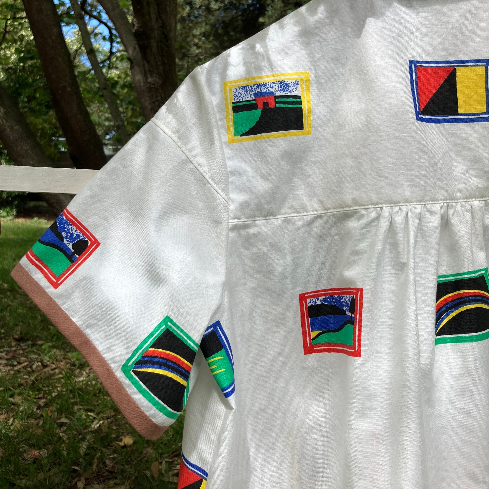 shirt made from 80s deadstock fabric with a print of tiny paintings in frames