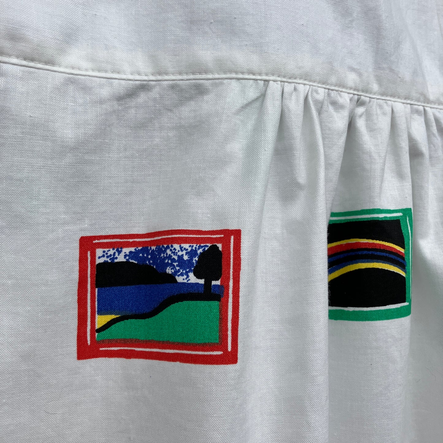 shirt made from 80s deadstock fabric with a print of tiny paintings in frames