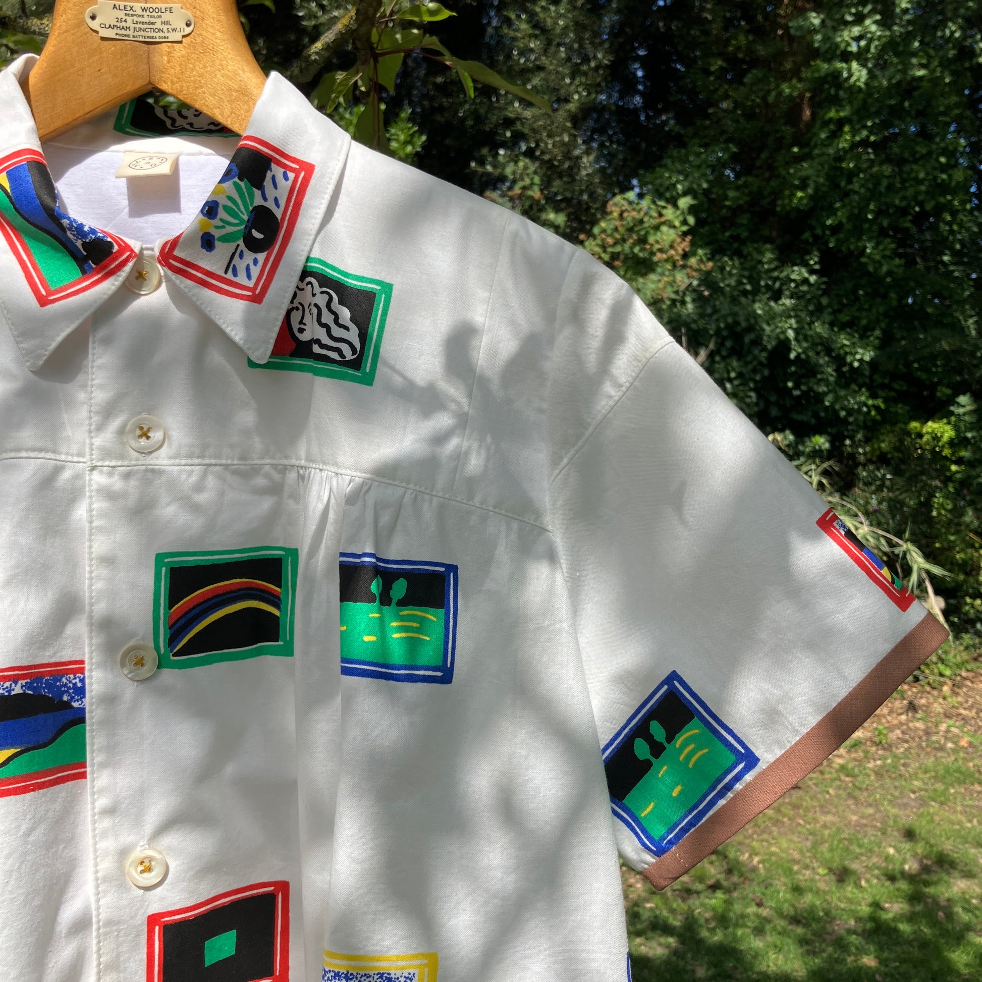 shirt made from 80s deadstock fabric with a print of tiny paintings in frames