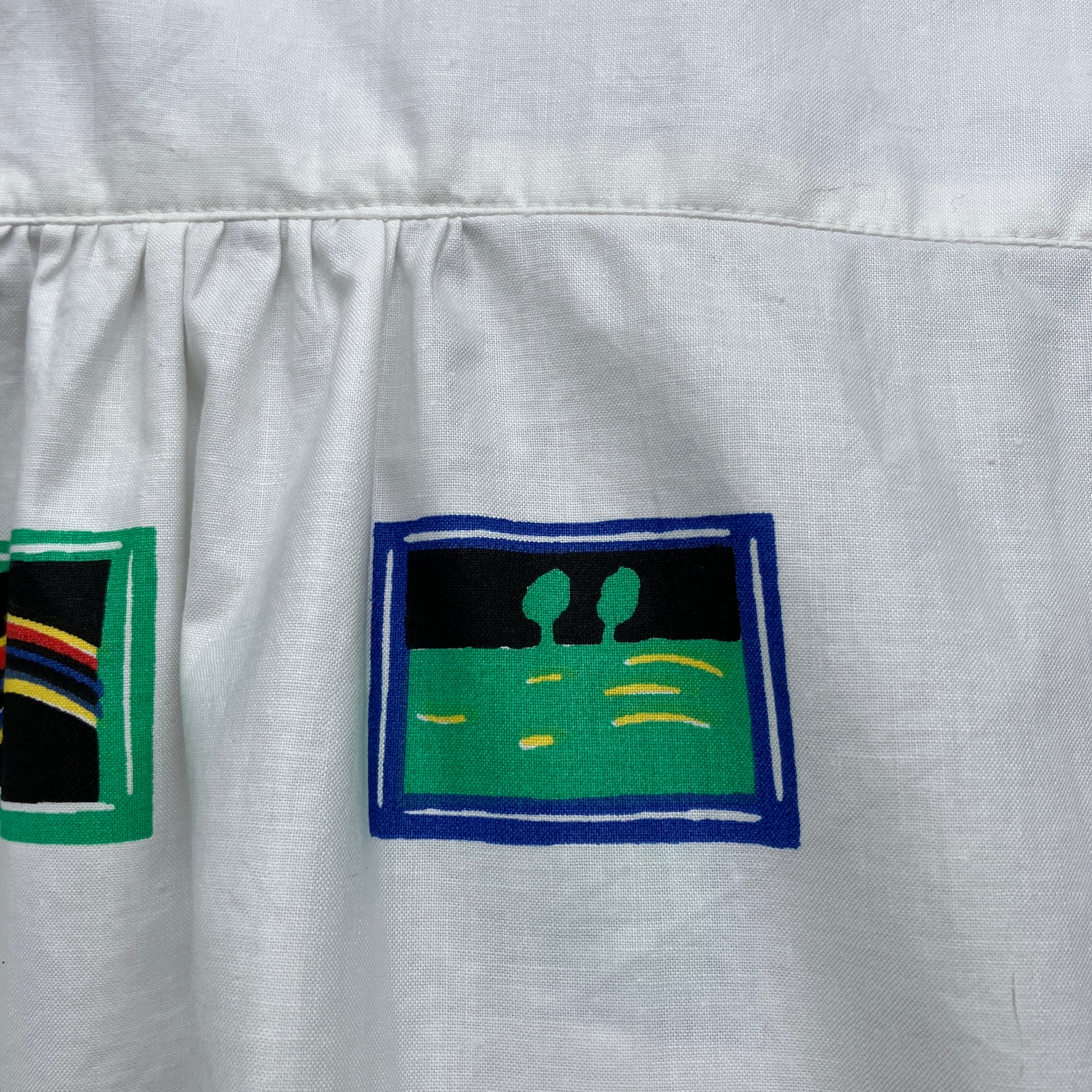 shirt made from 80s deadstock fabric with a print of tiny paintings in frames