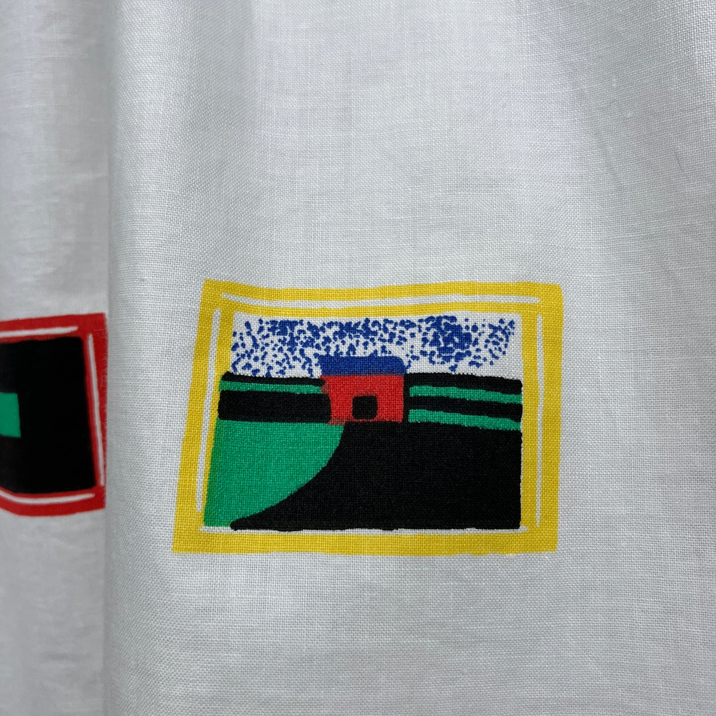 shirt made from 80s deadstock fabric with a print of tiny paintings in frames
