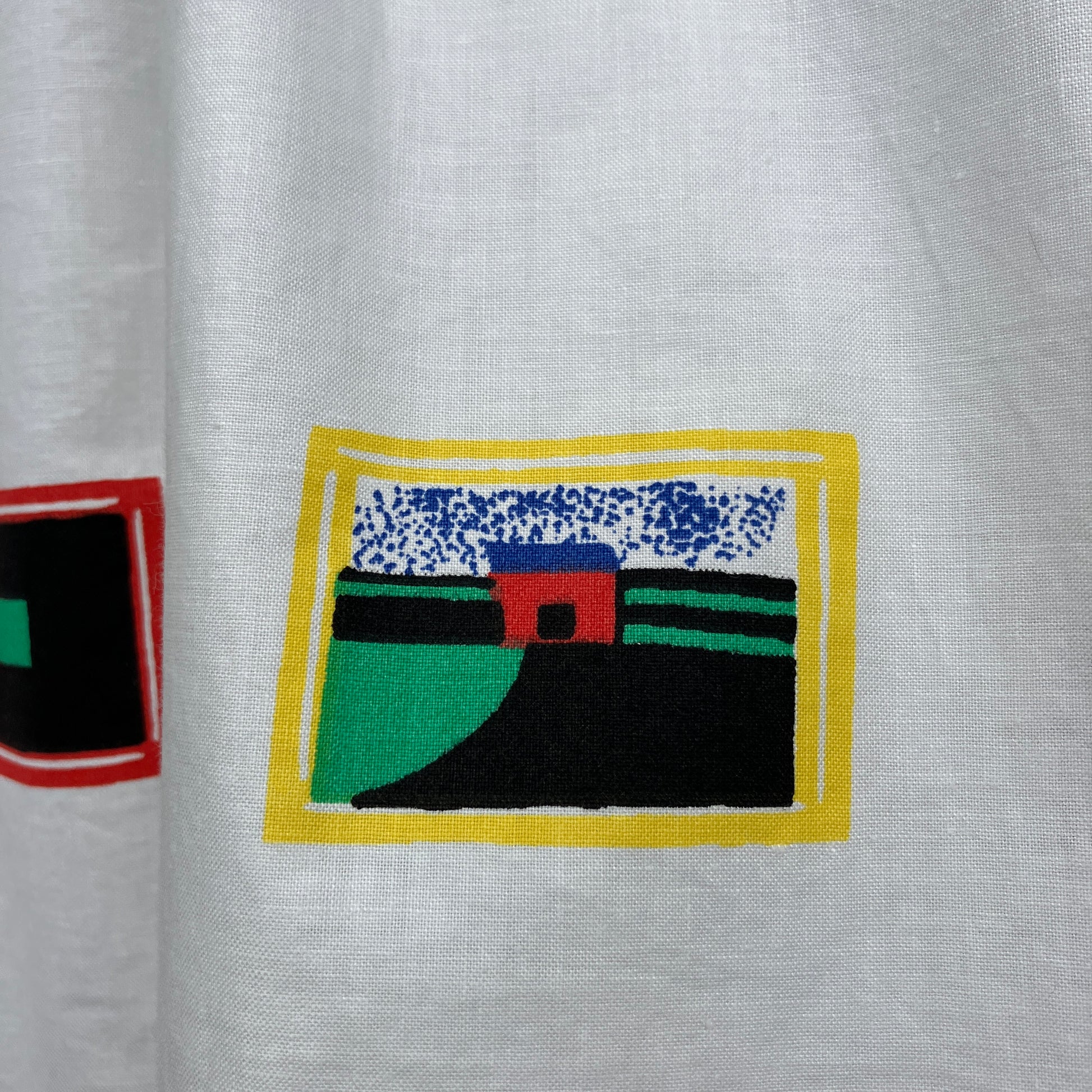 shirt made from 80s deadstock fabric with a print of tiny paintings in frames