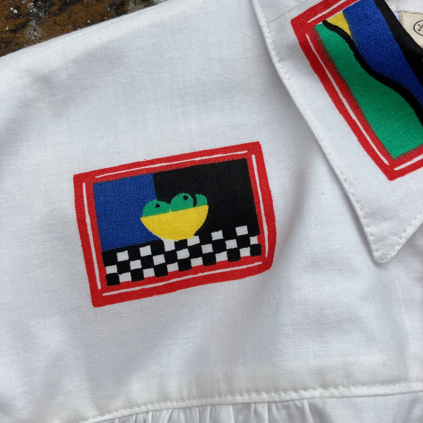 shirt made from 80s deadstock fabric with a print of tiny paintings in frames