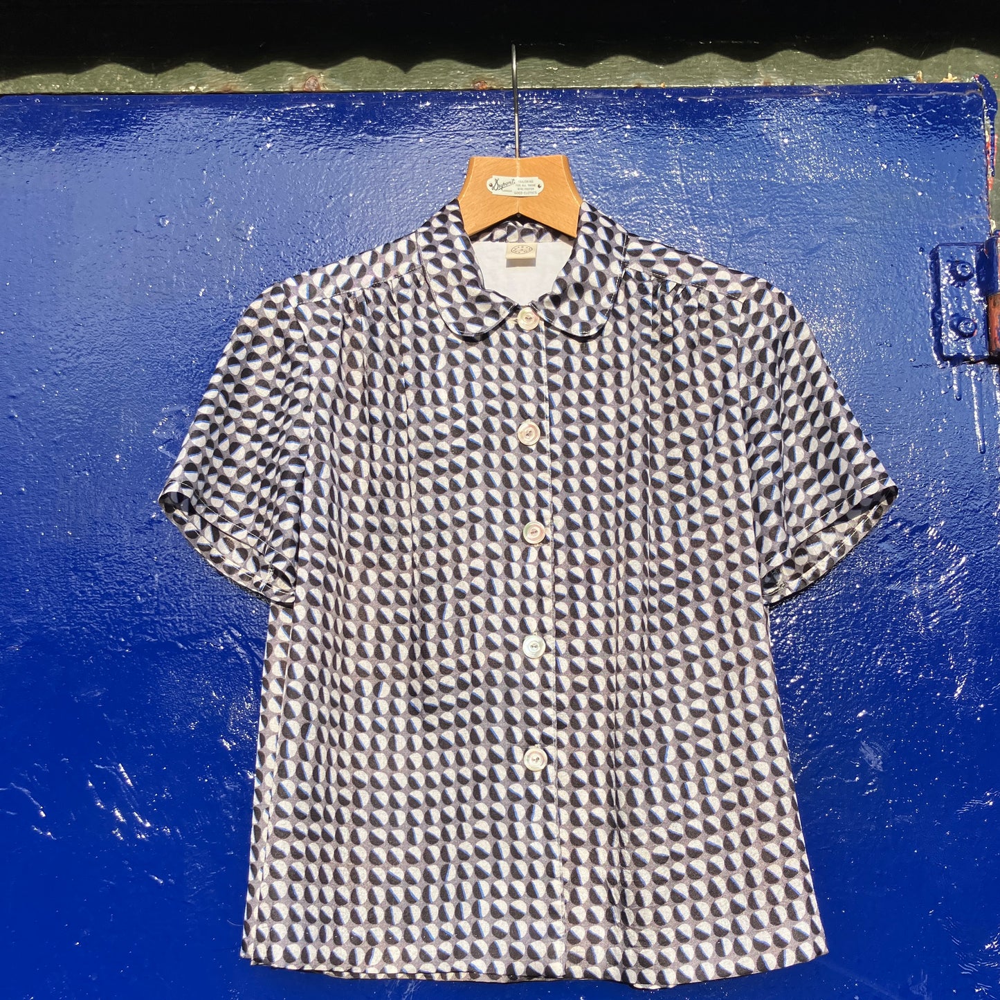 Geometric-print shirt made from reclaimed vintage fabric