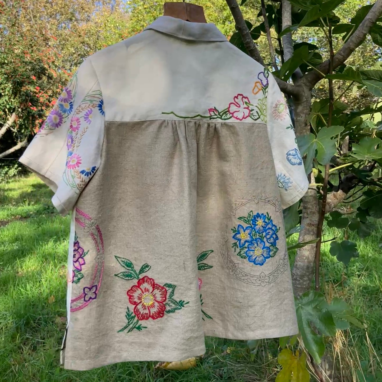 Shirt made from a patchwork of part-finished hand embroidered linen panels in various shades of off-white and natural.