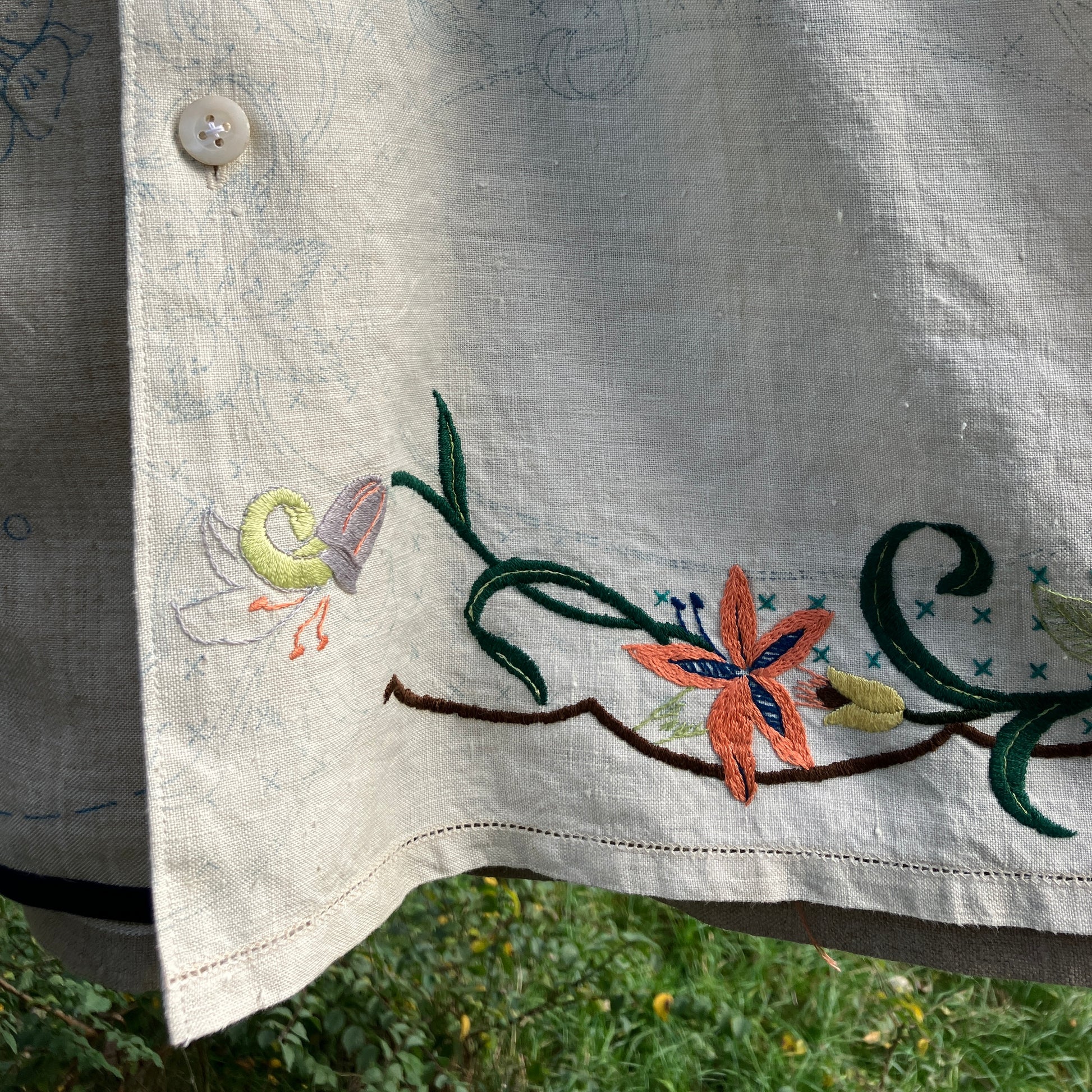 Shirt made from a patchwork of part-finished hand embroidered linen panels in various shades of off-white and natural.