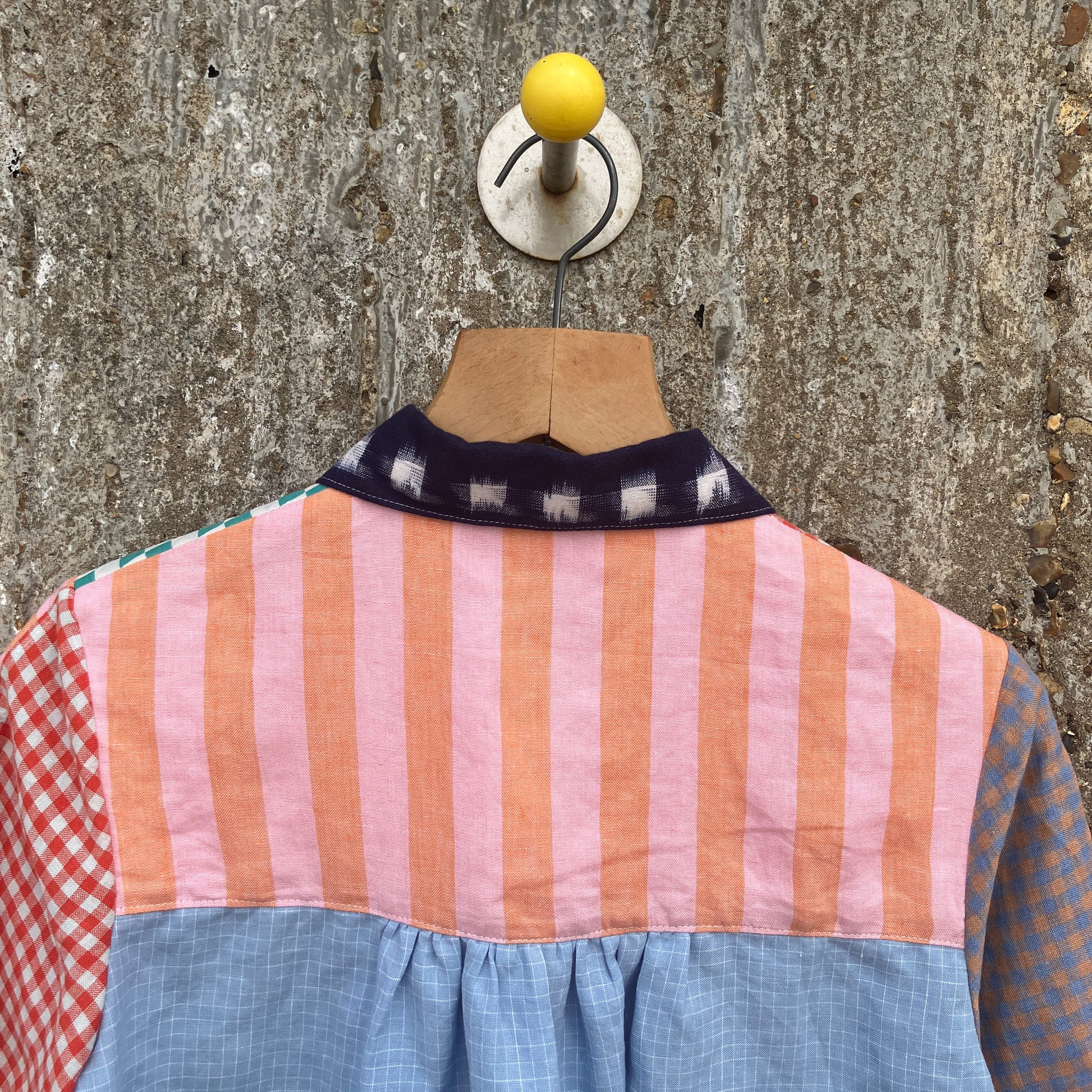 Multicoloured patchwork shirt made from a variety of checked and striped linen offcuts