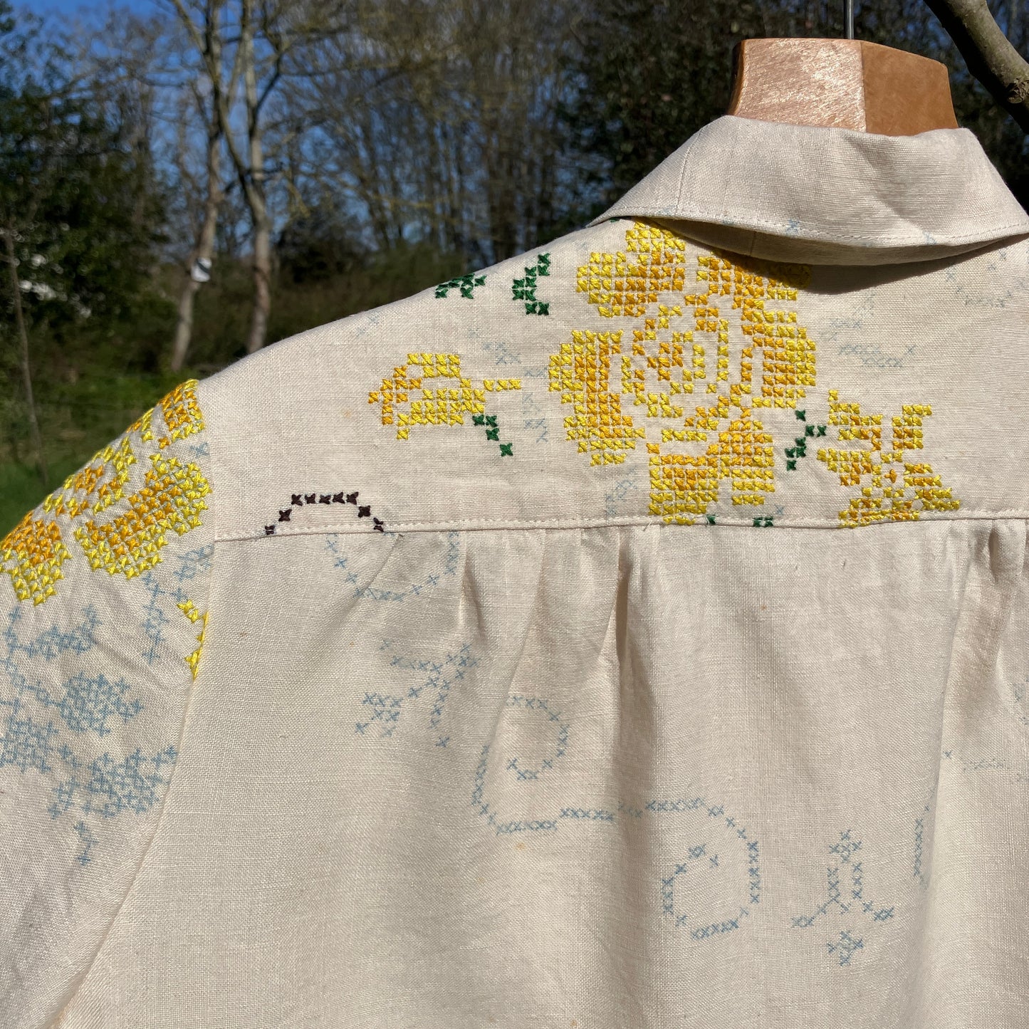 Blouse made from recycled cross stitch linen tablecloth