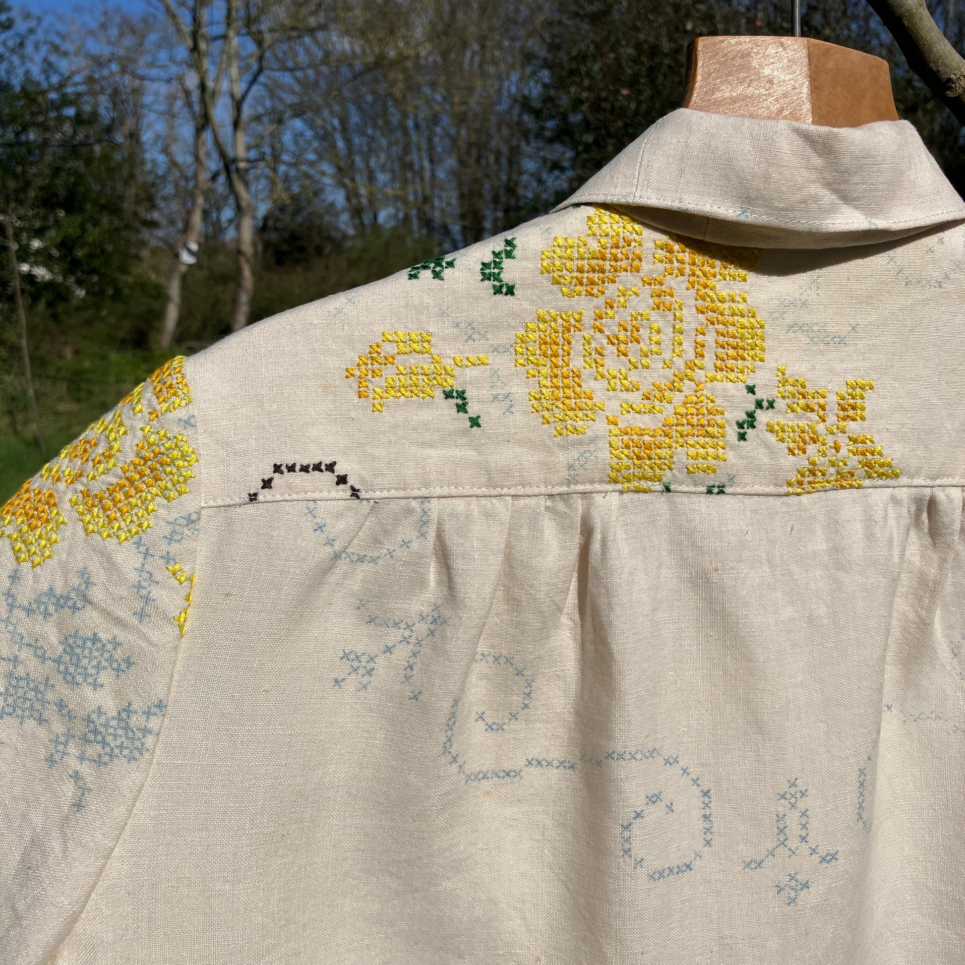 Blouse made from recycled cross stitch linen tablecloth