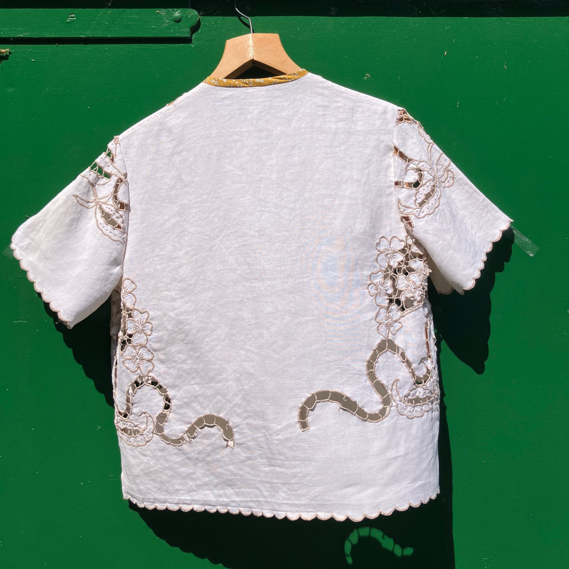 Top made from a vintage cutwork linen tablecloth