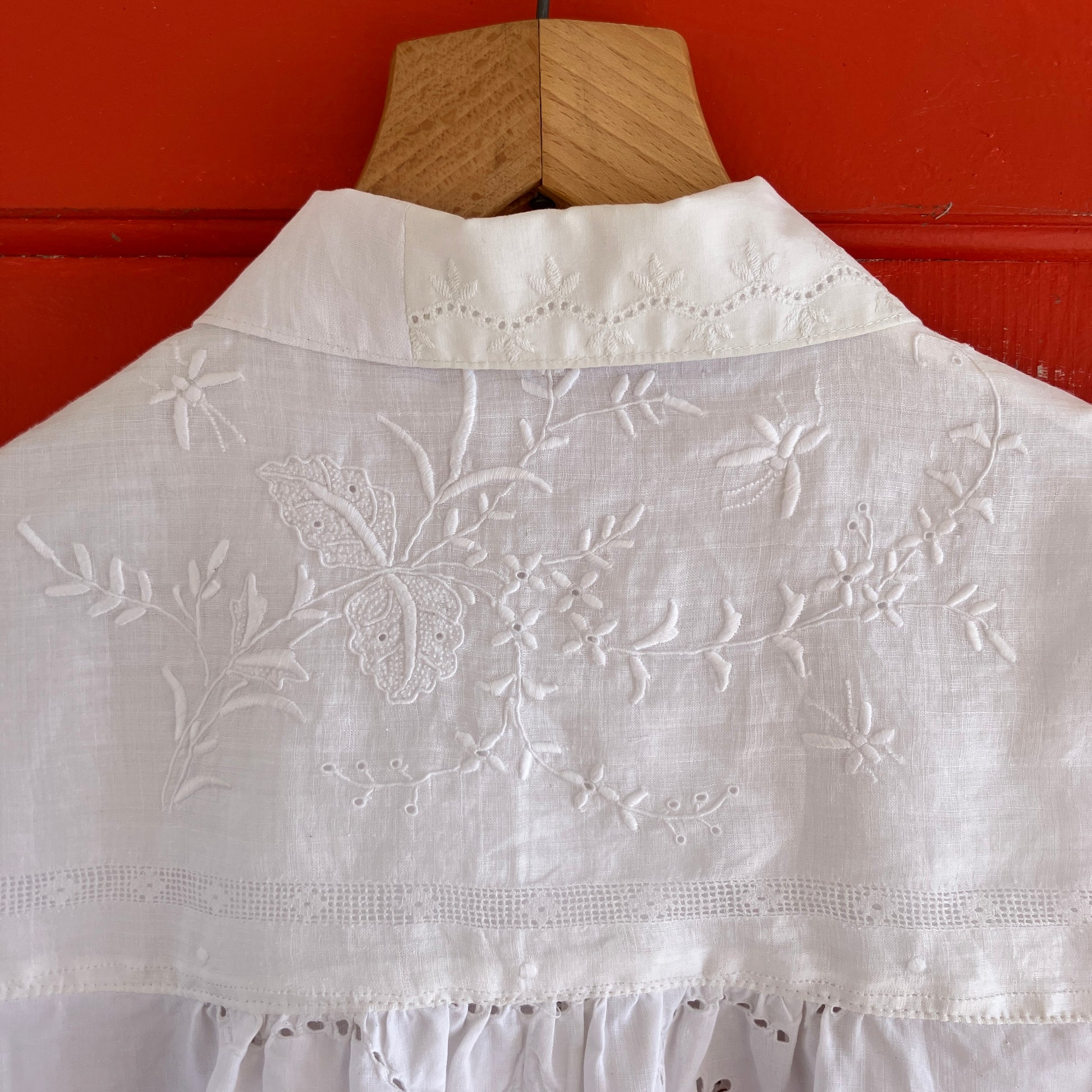 pretty, breezy blouse made from a 
patchwork of reclaimed vintage cotton and linen white cutwork tablecloths.