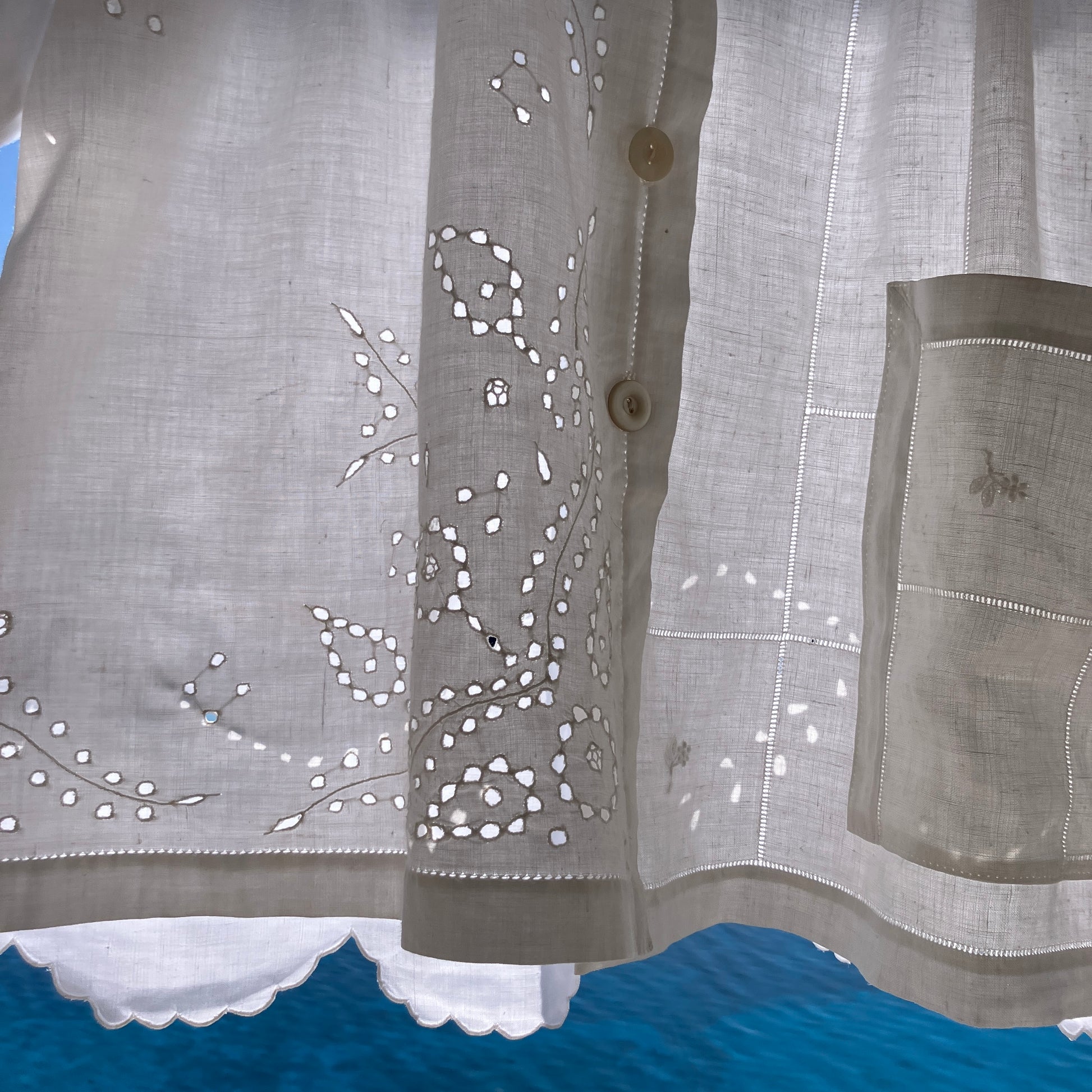 pretty, breezy blouse made from a 
patchwork of reclaimed vintage cotton and linen white cutwork tablecloths.