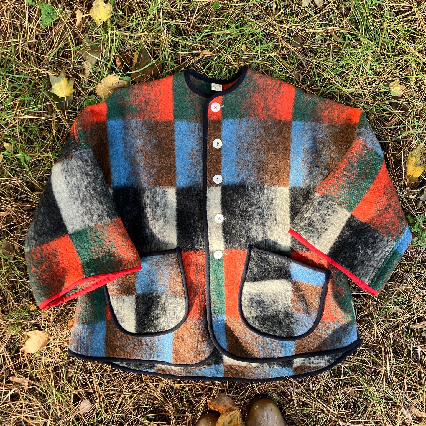 Cosy jacket made from a vintage blanket in autumnal shades of orange, blue, green and brown.