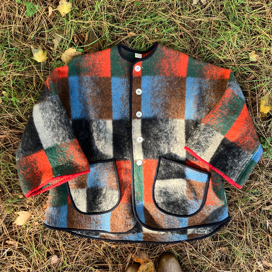 Cosy jacket made from a vintage blanket in autumnal shades of orange, blue, green and brown.