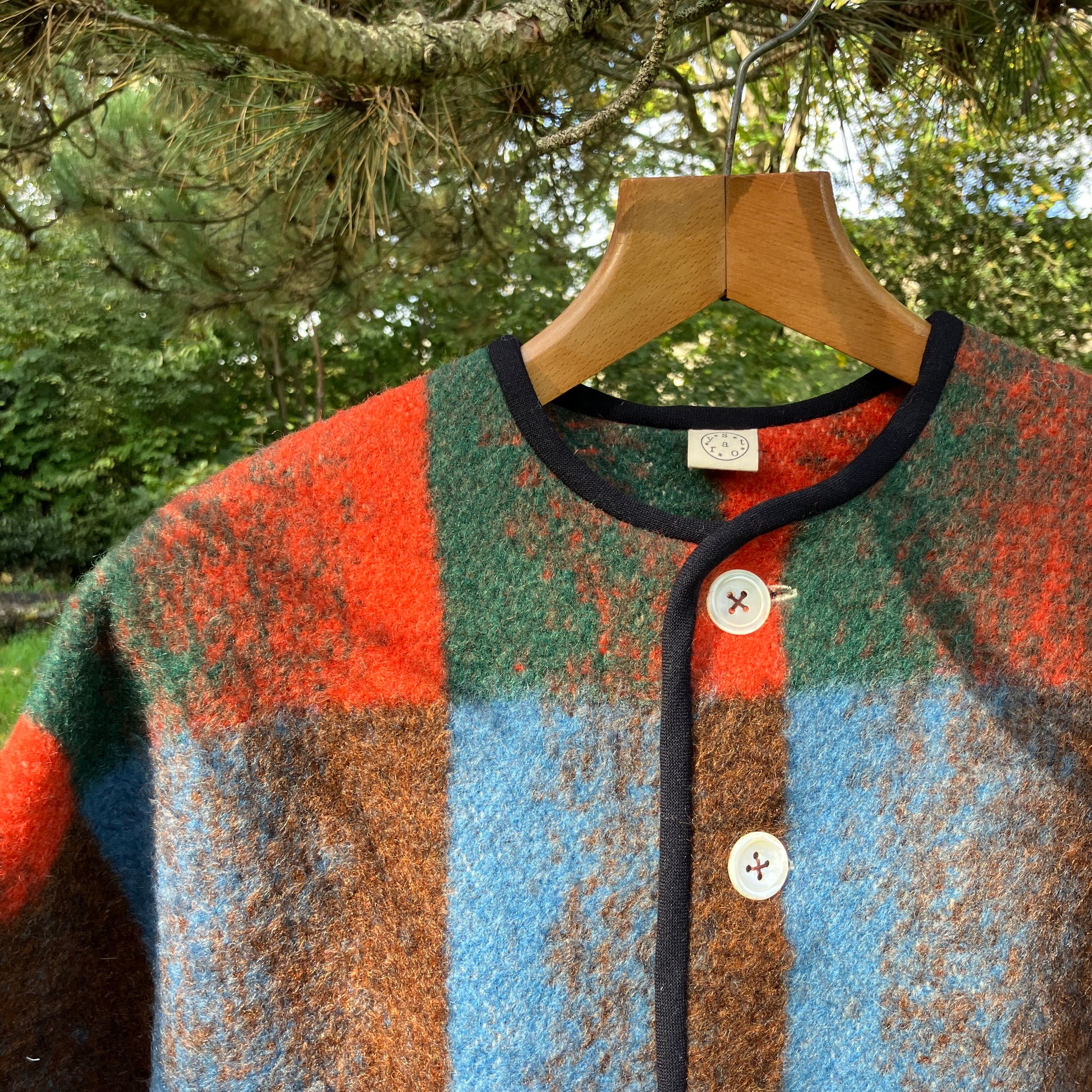 Cosy jacket made from a vintage blanket in autumnal shades of orange, blue, green and brown.