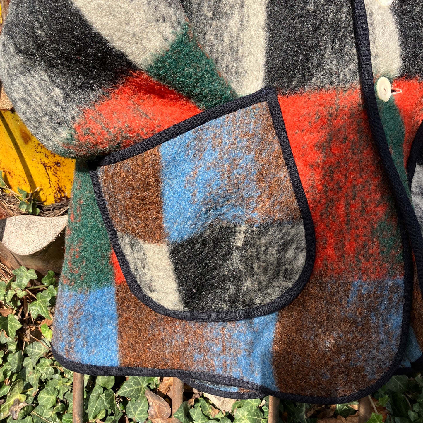 Cosy jacket made from a vintage blanket in autumnal shades of orange, blue, green and brown.