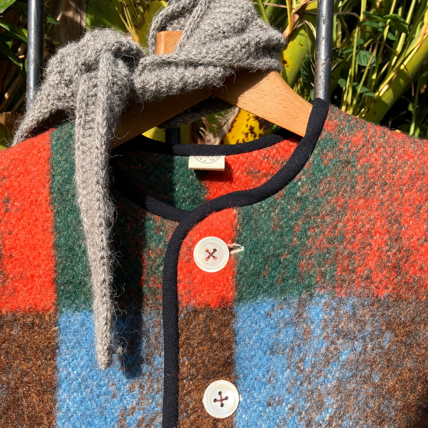 Cosy jacket made from a vintage blanket in autumnal shades of orange, blue, green and brown.