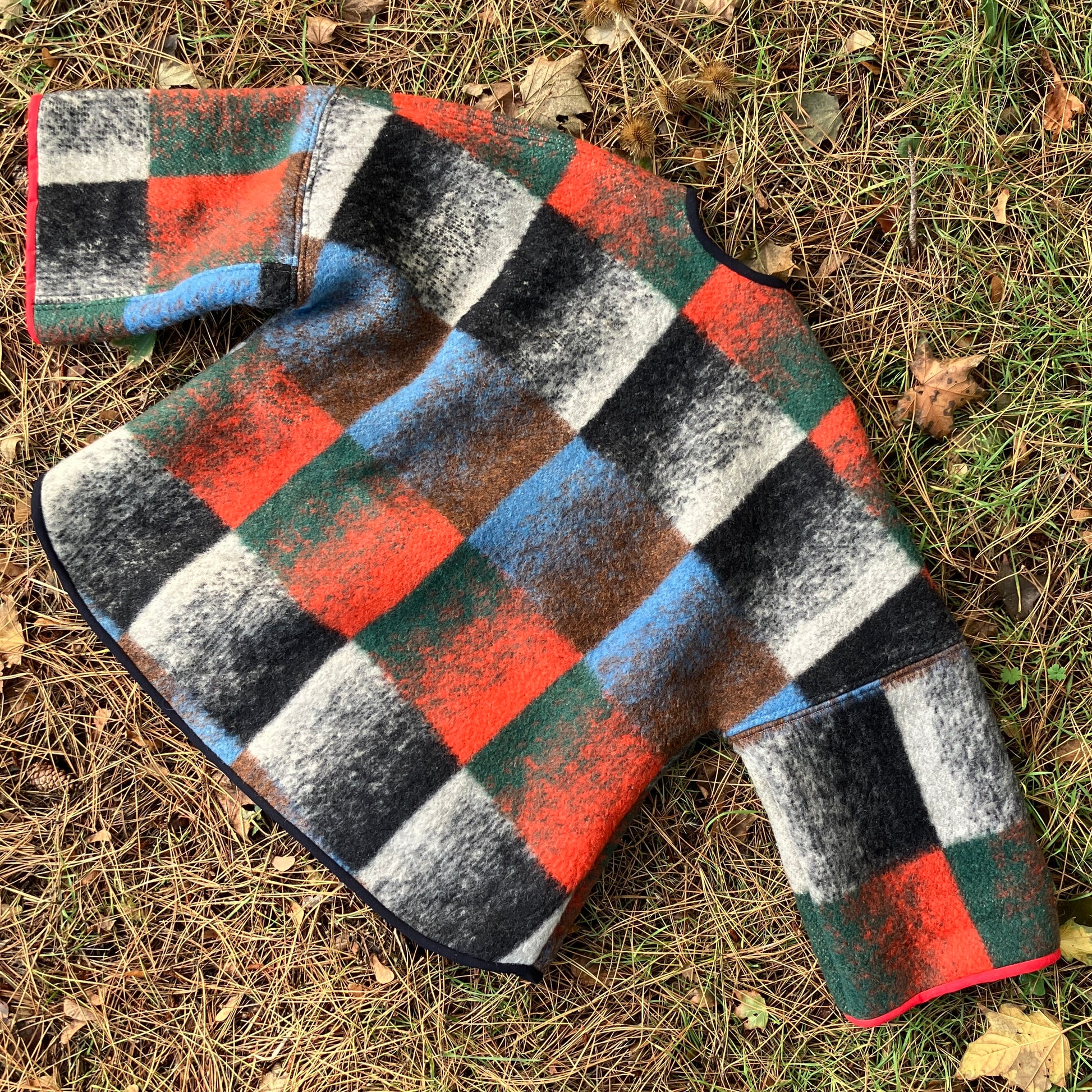 Cosy jacket made from a vintage blanket in autumnal shades of orange, blue, green and brown.