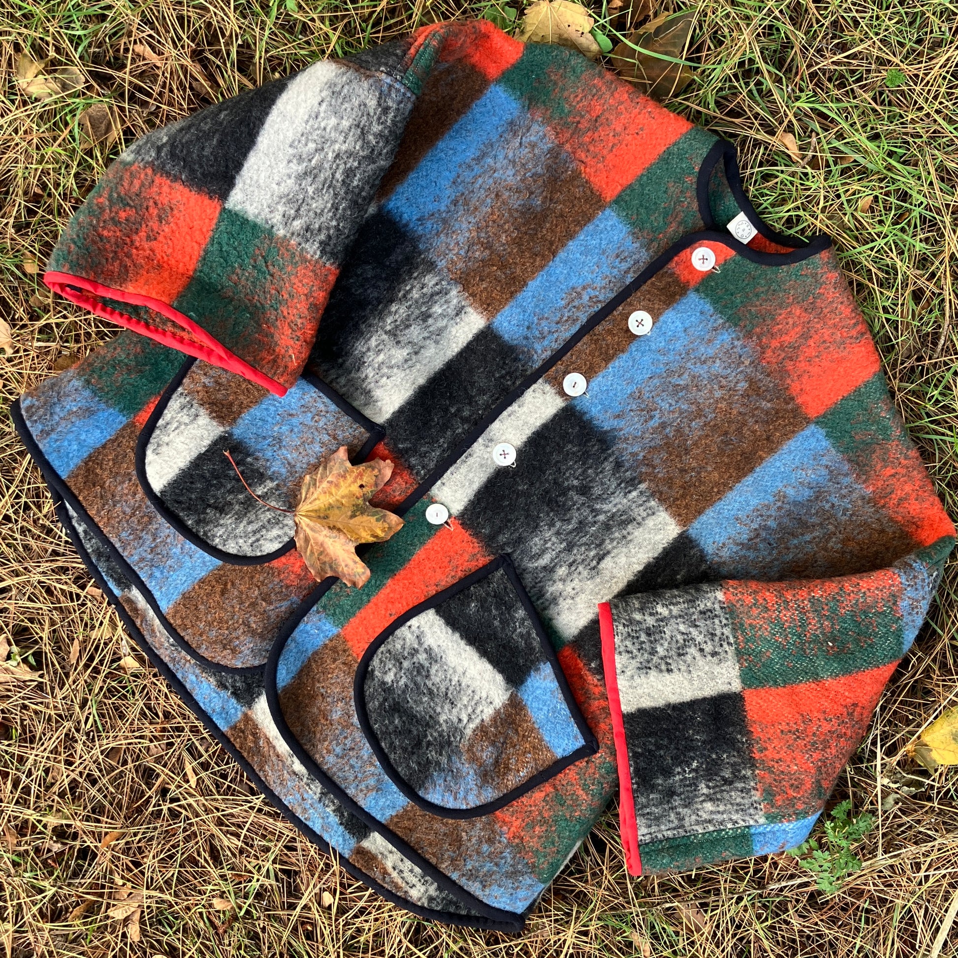 Cosy jacket made from a vintage blanket in autumnal shades of orange, blue, green and brown.