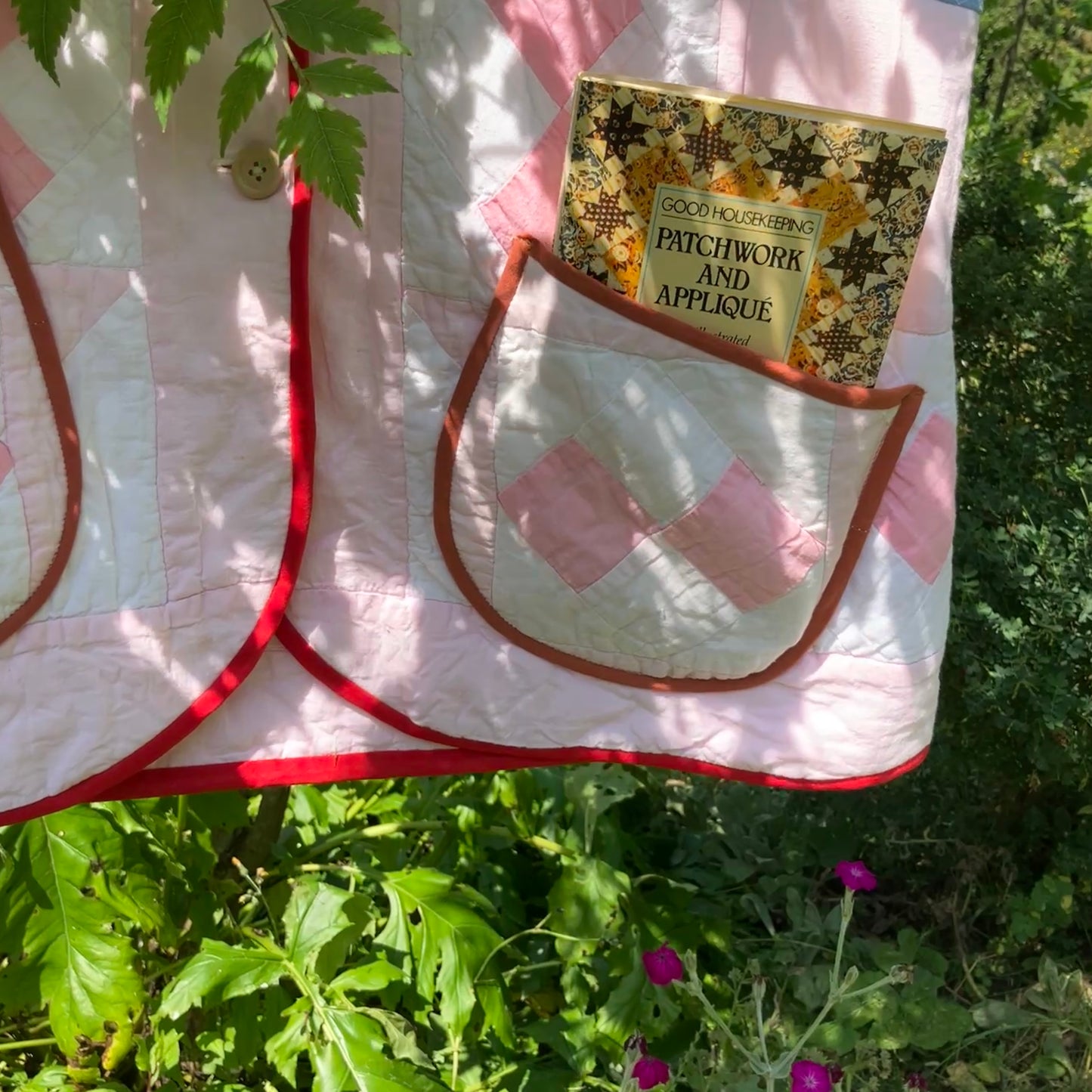 Vest made from a reclaimed pink and white patchwork quilt