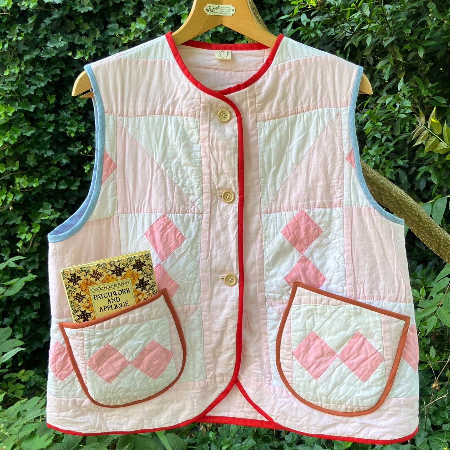 Vest made from a reclaimed pink and white patchwork quilt