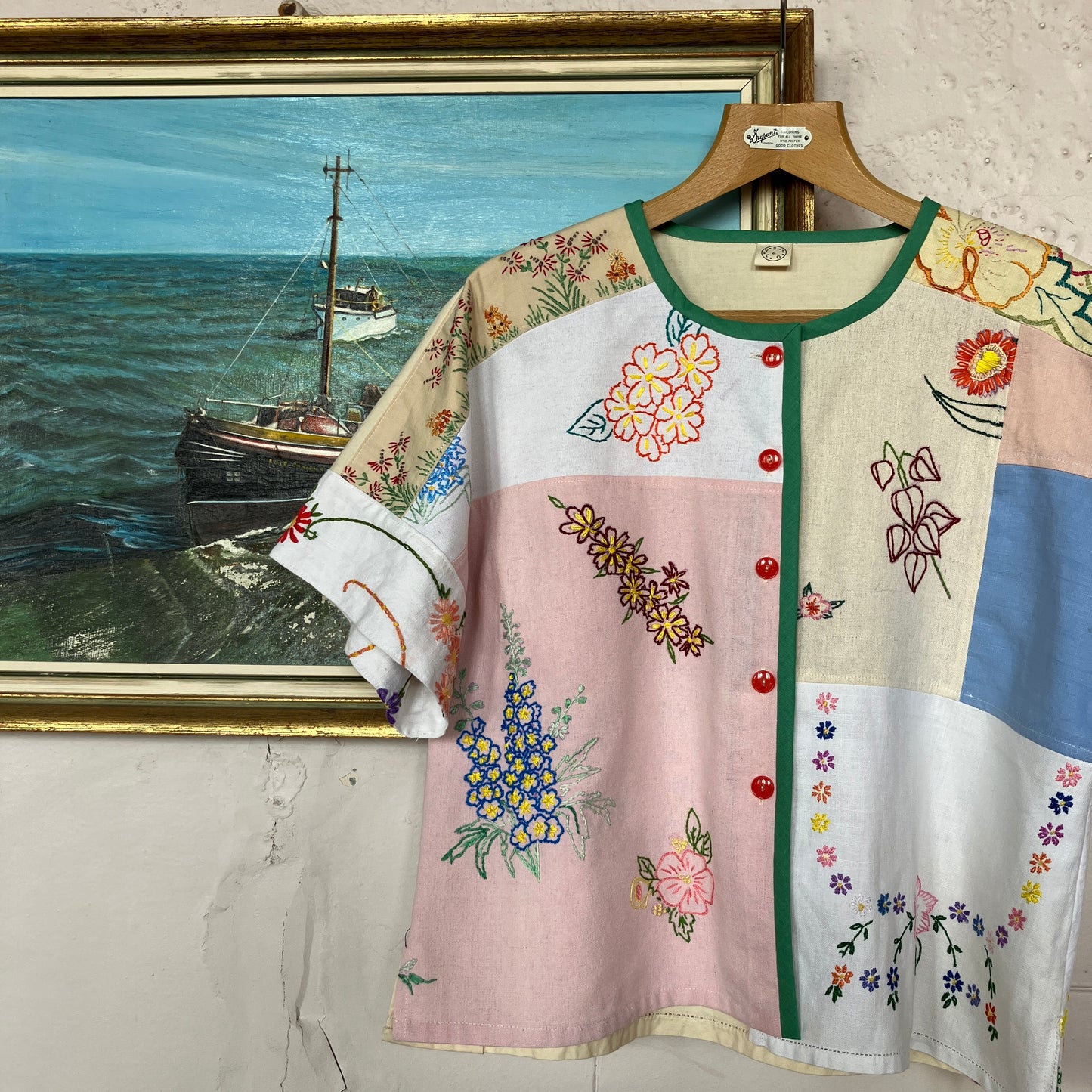 Boxy top made from a patchwork of vintage floral embroidered pastel coloured cotton and linen tablecloths and tray cloths