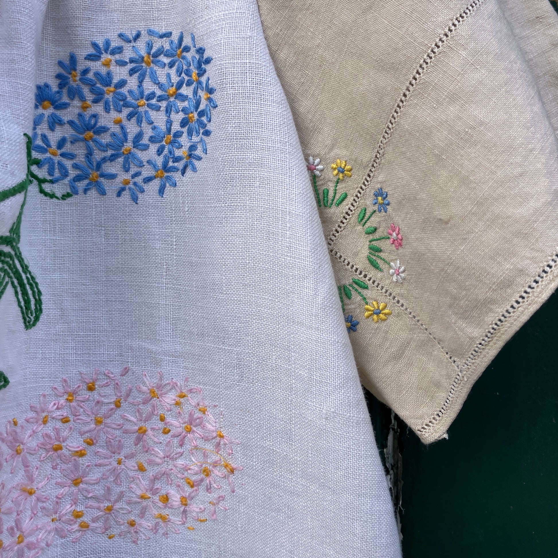 Recycled fabric shirt with embroidery depicting a village pub
