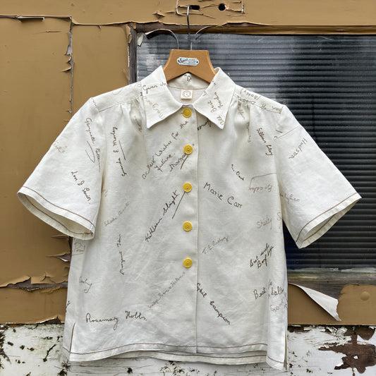 Linen shirt made from a vintage tablecloth hand embroidered with signatures and good luck messages