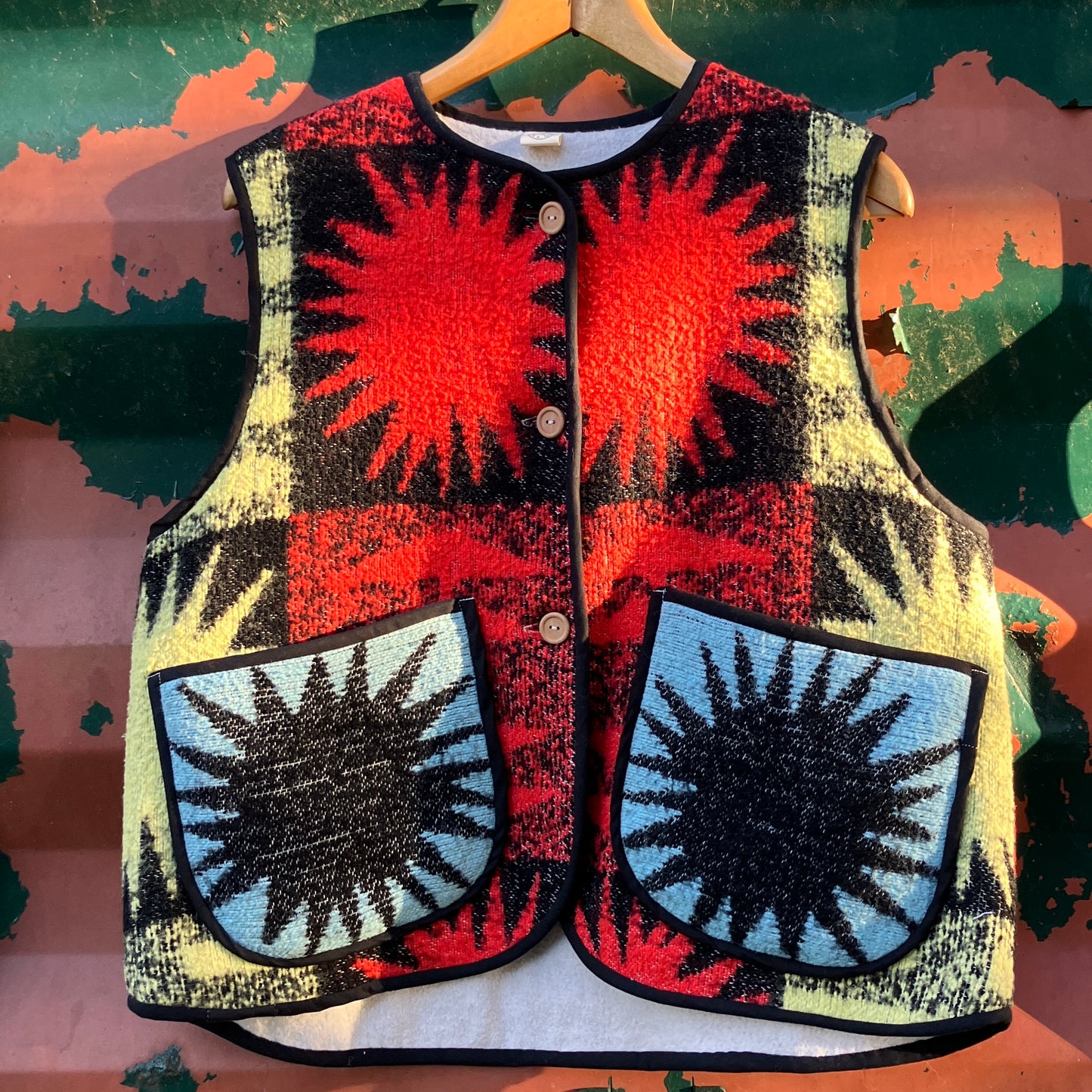Wooly vest made from a recycled blanket with a star pattern