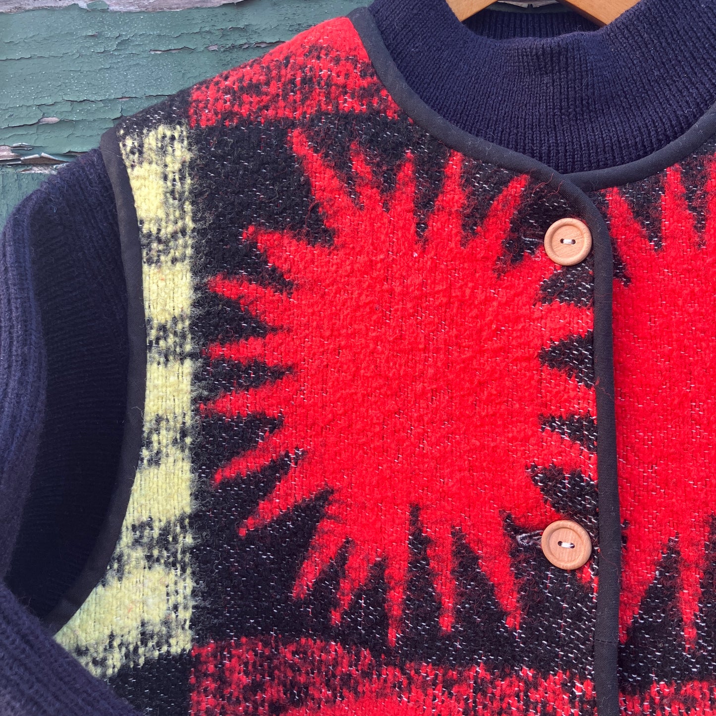 Wooly vest made from a recycled blanket with a star pattern