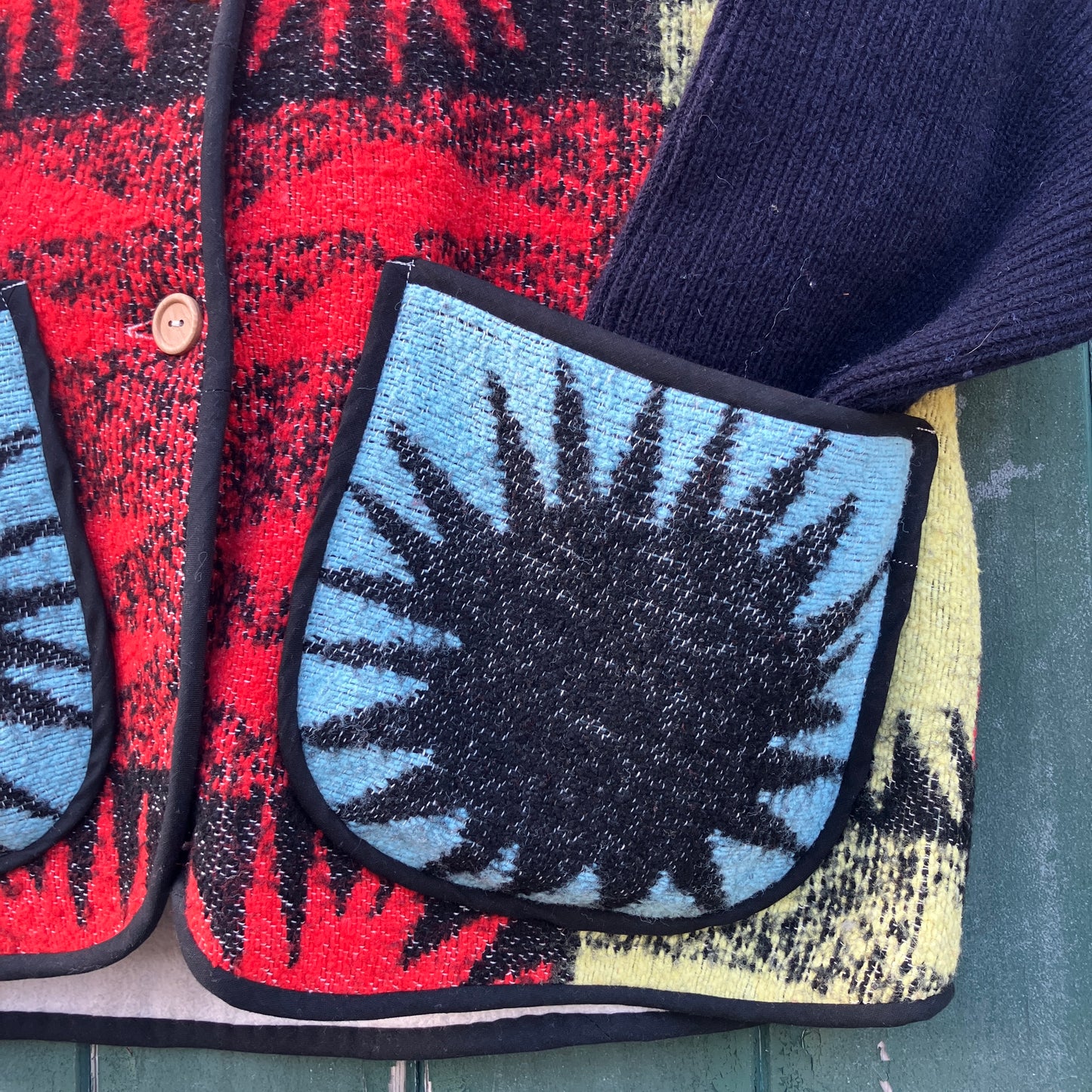 Wooly vest made from a recycled blanket with a star pattern