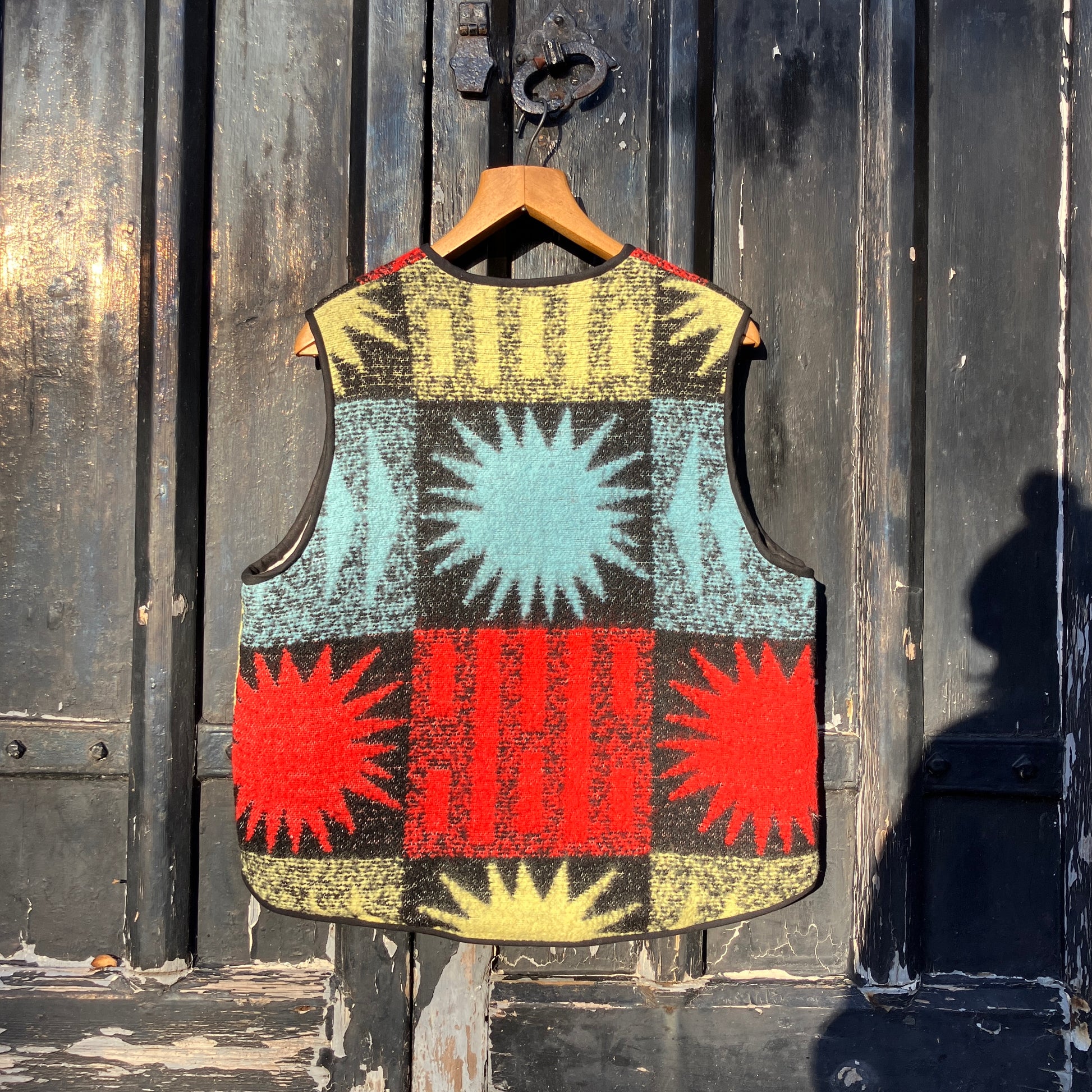 Wooly vest made from a recycled blanket with a star pattern