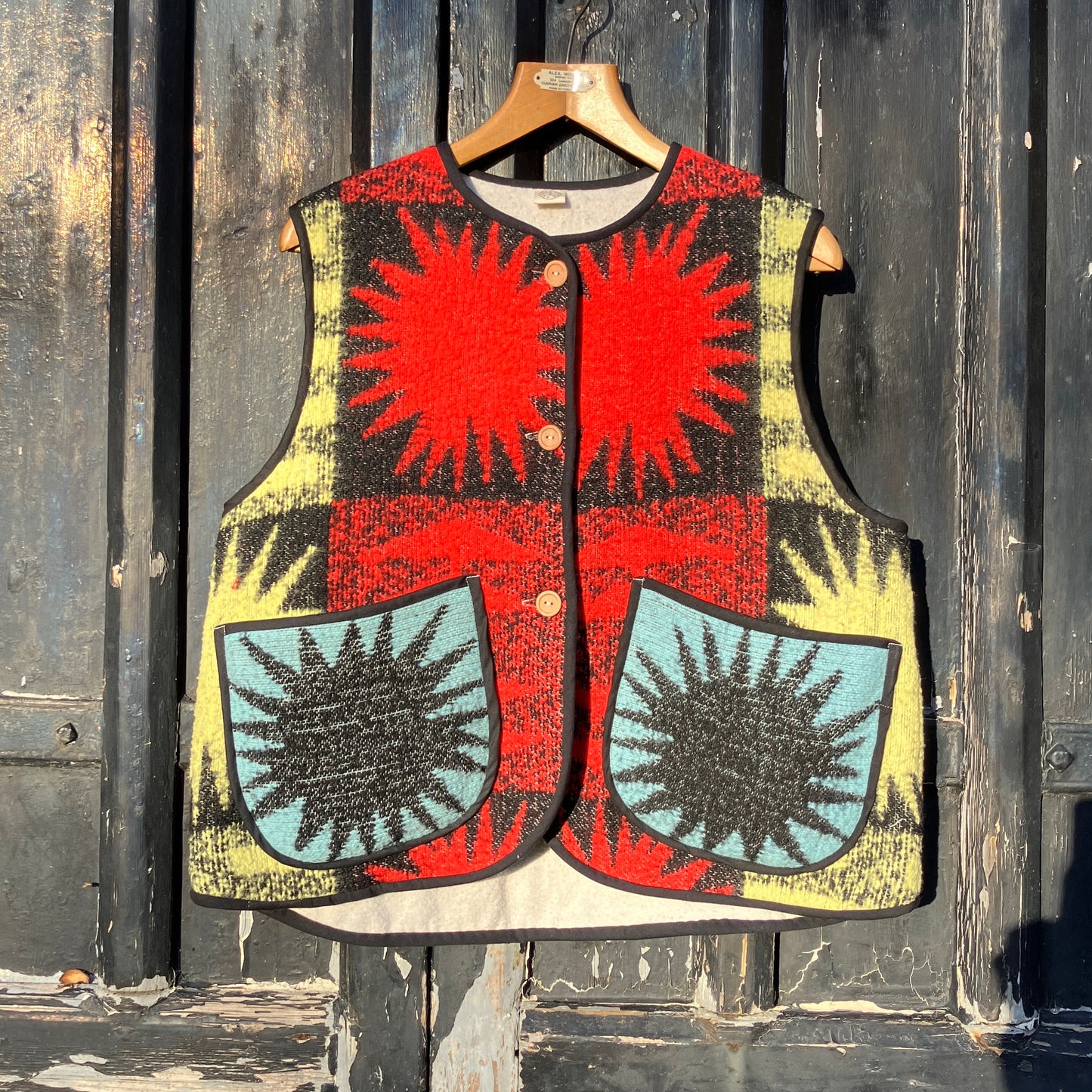 Wooly vest made from a recycled blanket with a star pattern