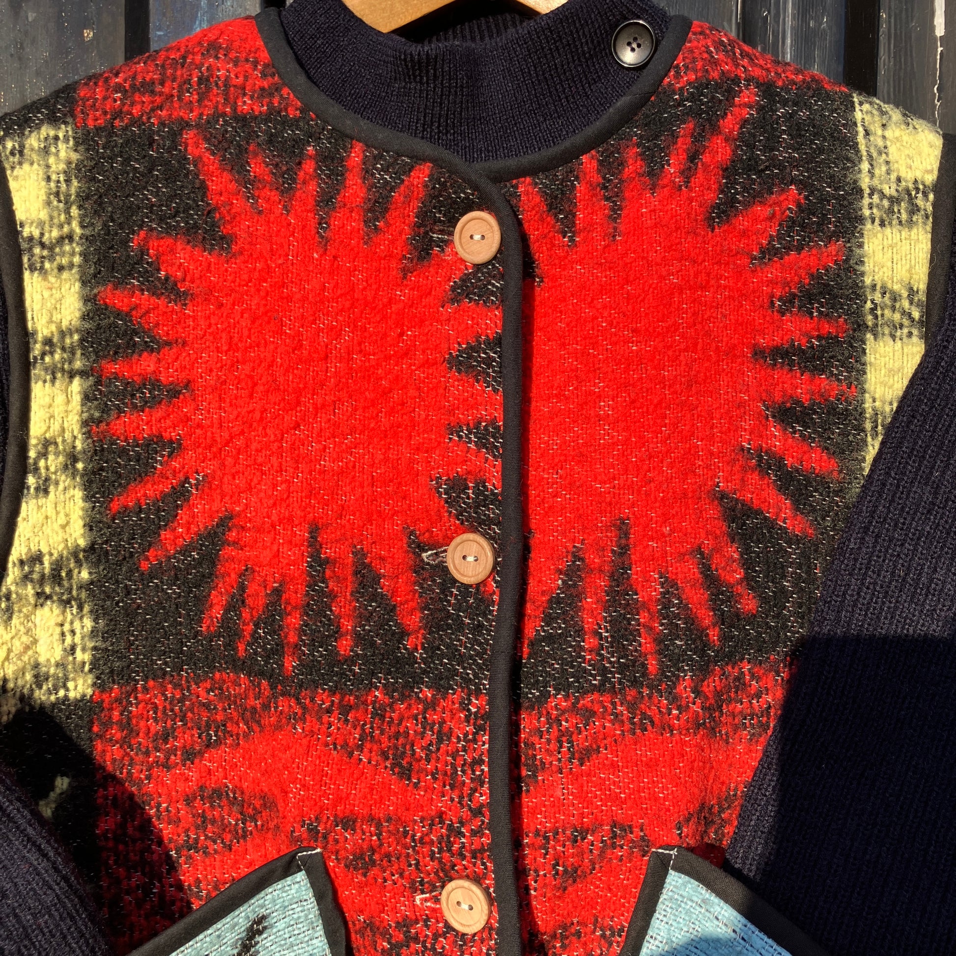 Wooly vest made from a recycled blanket with a star pattern