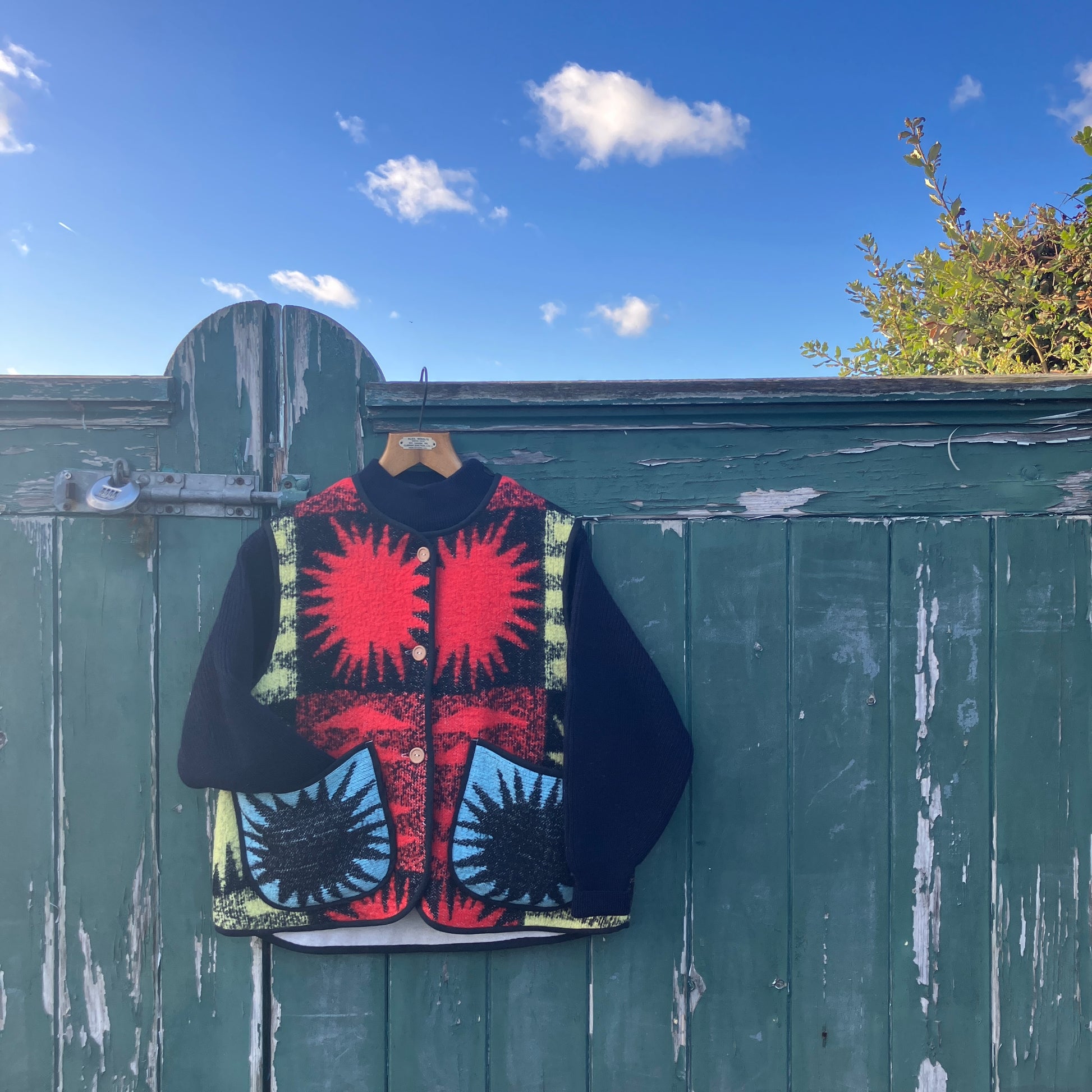 Wooly vest made from a recycled blanket with a star pattern