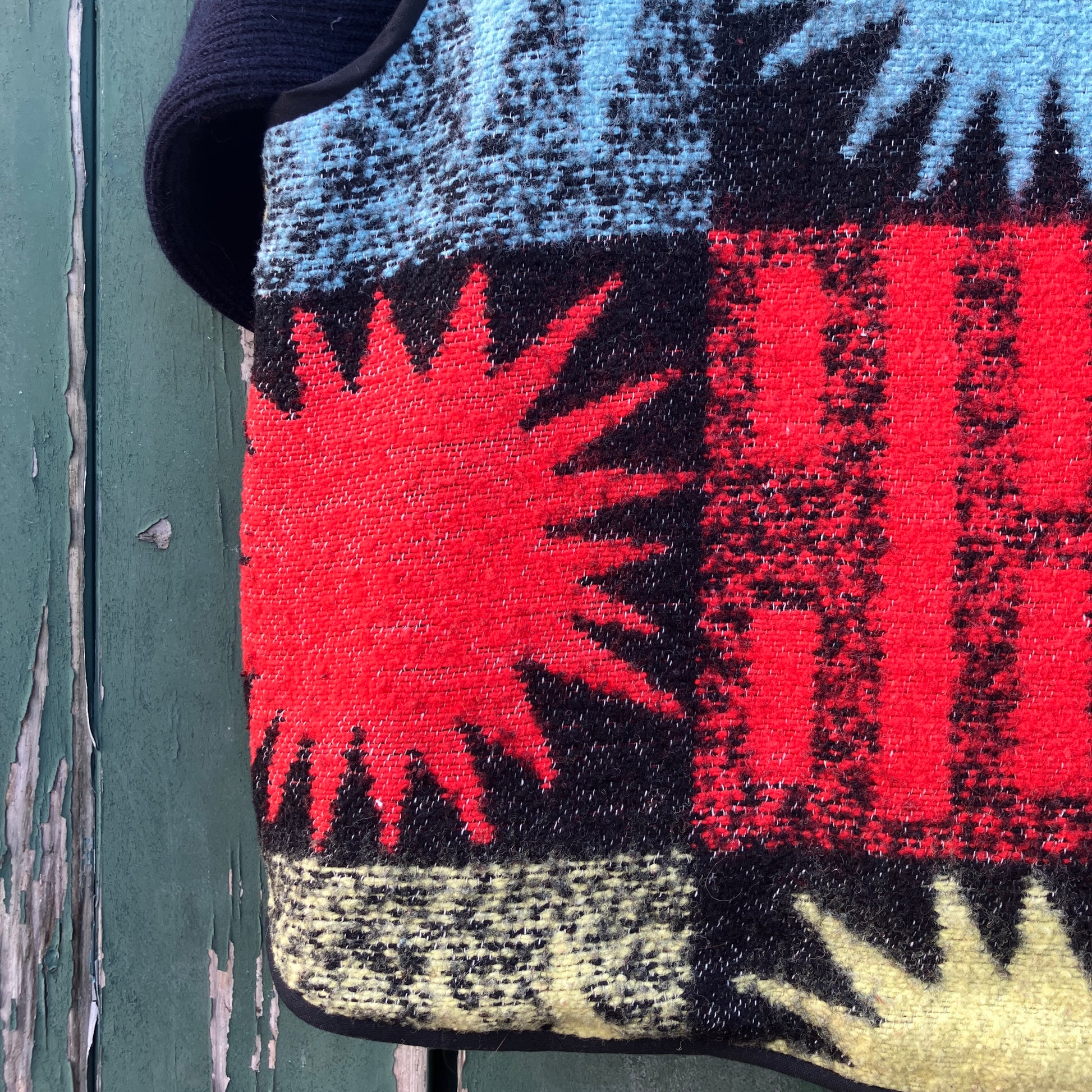 Wooly vest made from a recycled blanket with a star pattern