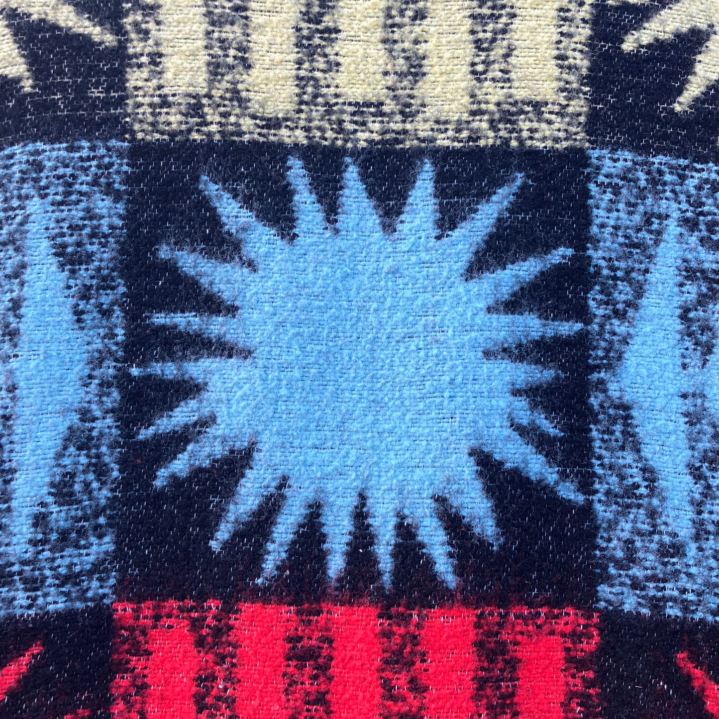 Wooly vest made from a recycled blanket with a star pattern