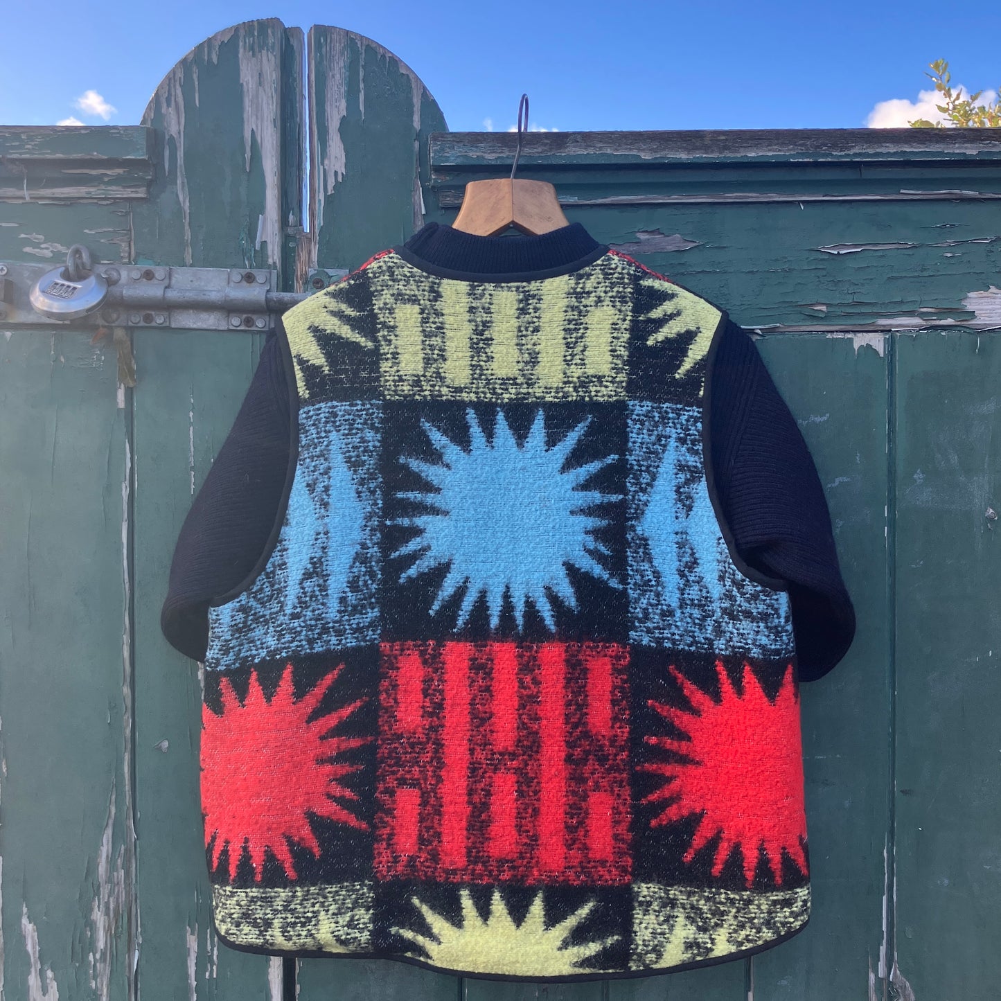 Wooly vest made from a recycled blanket with a star pattern