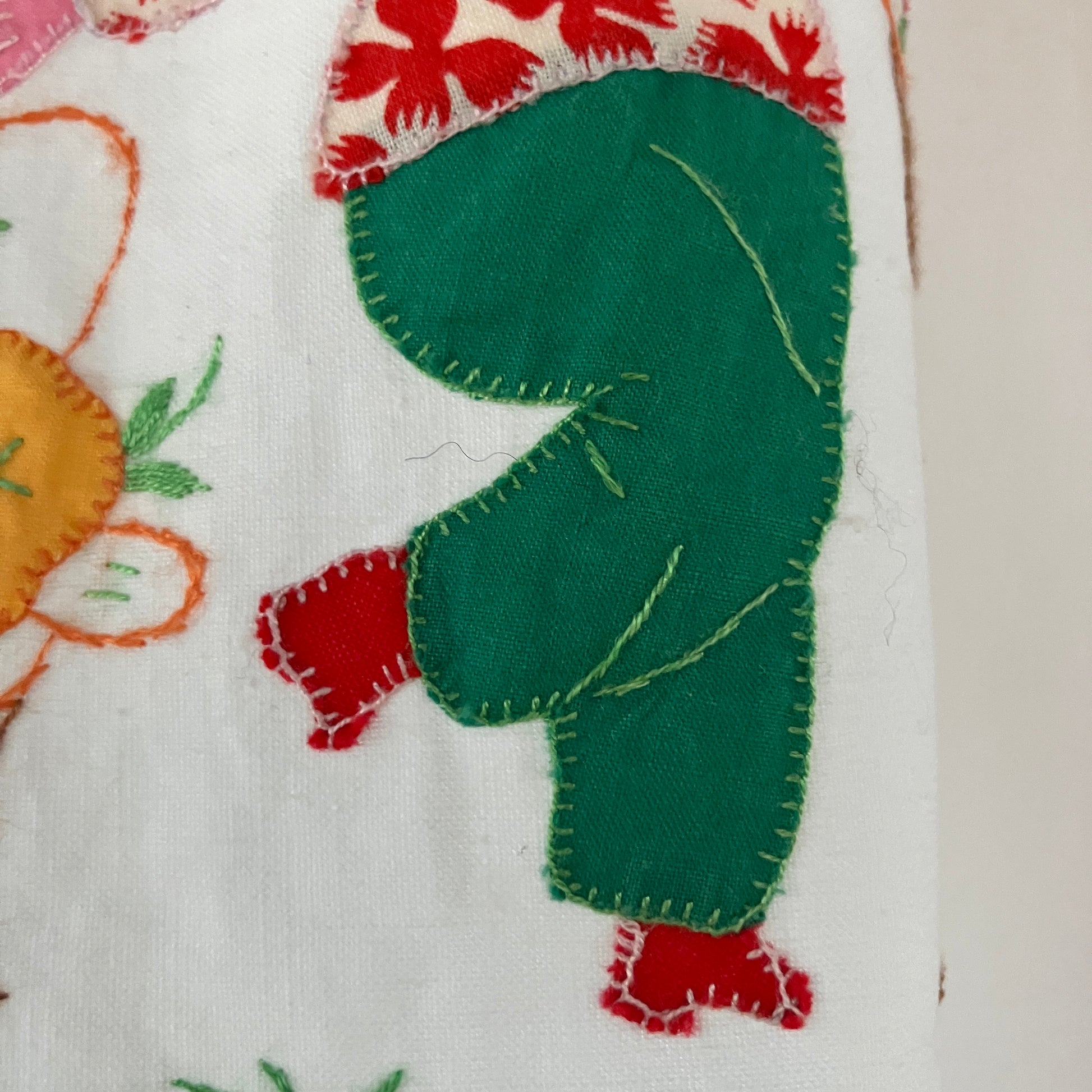 shirt made from reclaimed vintage pillowcases with two appliqué ladies