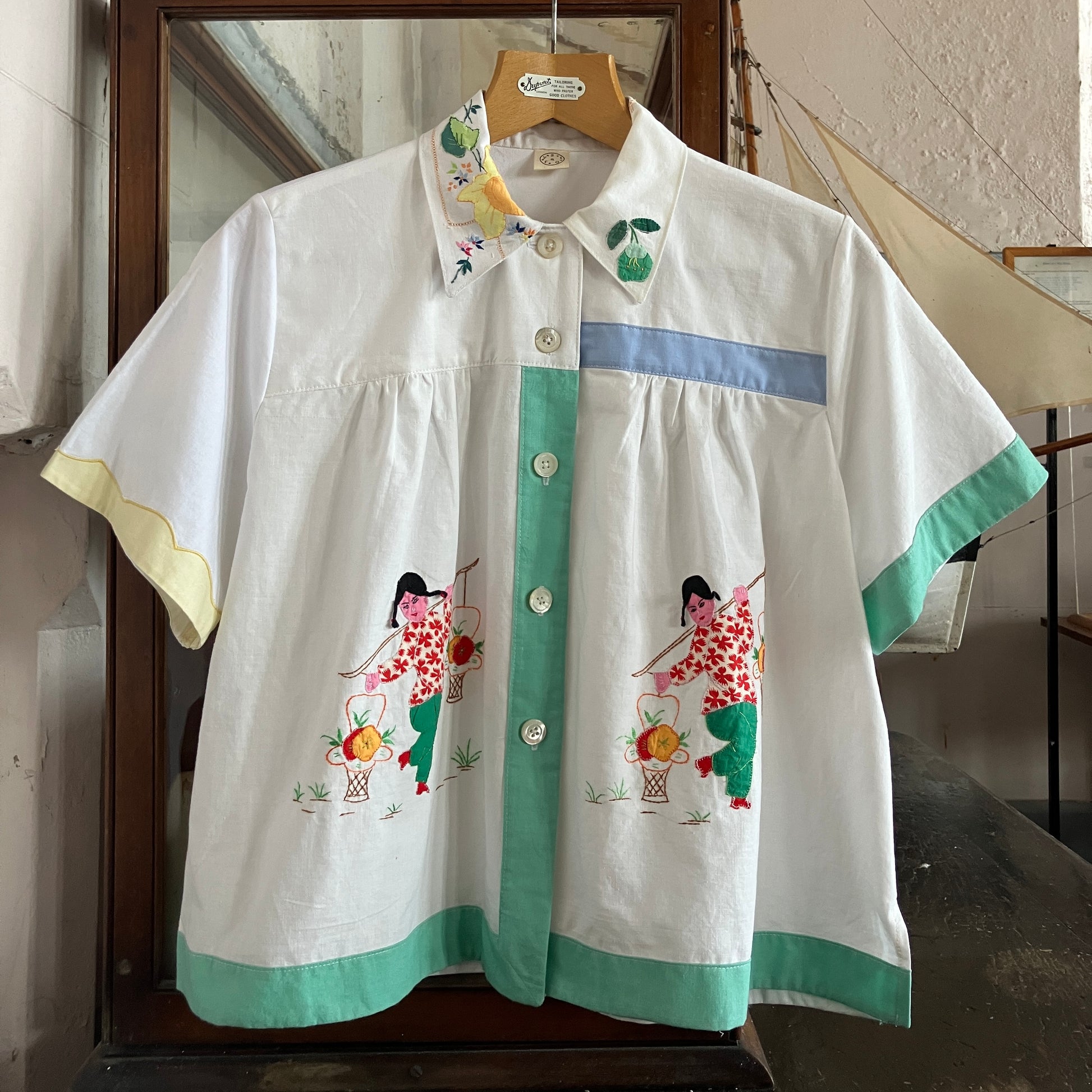 shirt made from reclaimed vintage pillowcases with two appliqué ladies