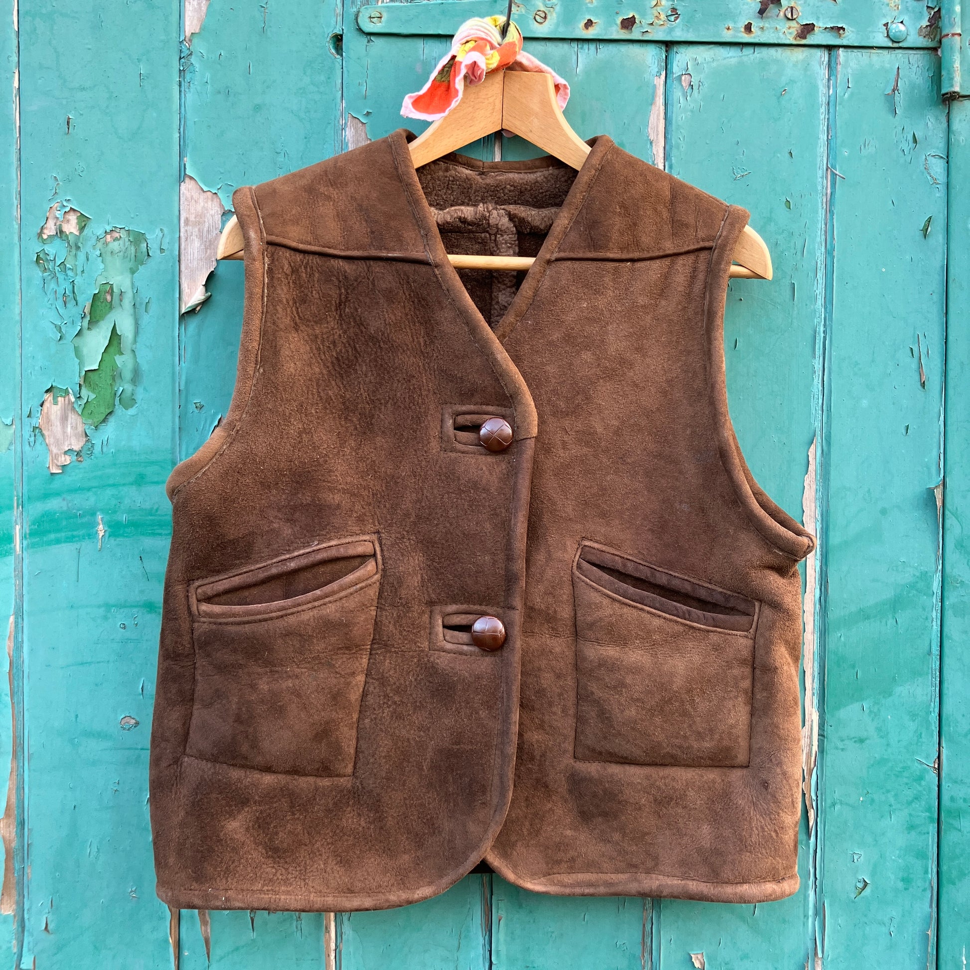 Shearling vest or waistcoat made from a brown vintage sheepskin coat.