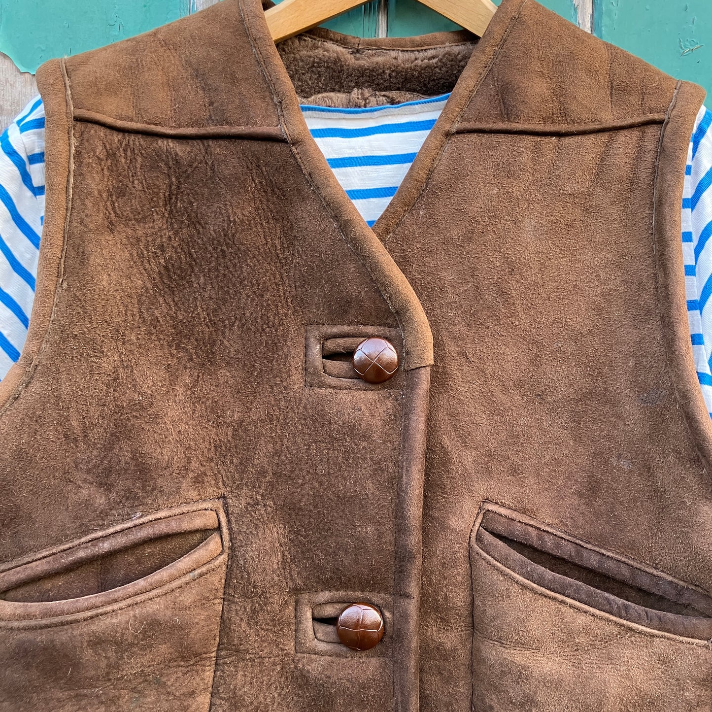 Shearling vest or waistcoat made from a brown vintage sheepskin coat.