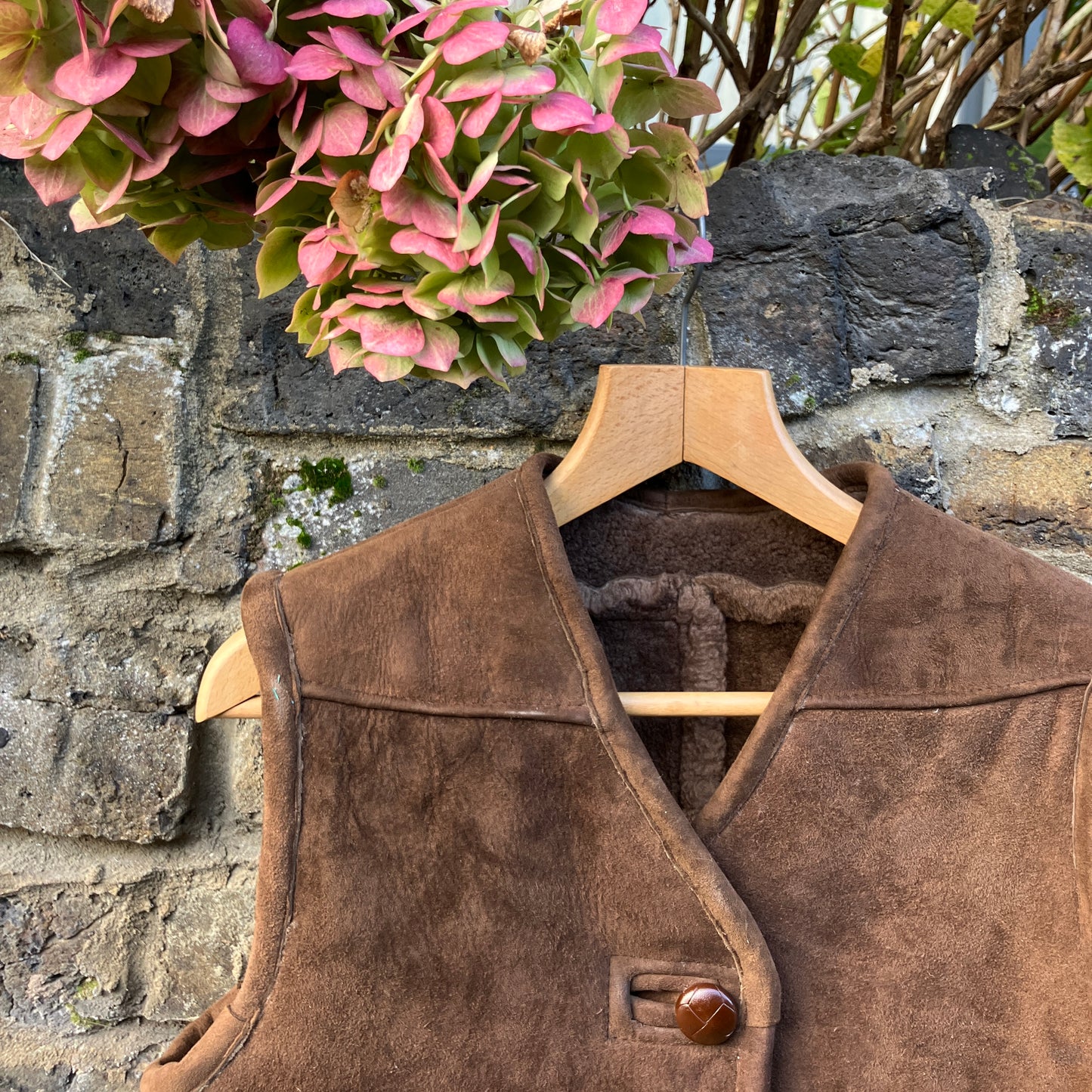 Shearling vest or waistcoat made from a brown vintage sheepskin coat.